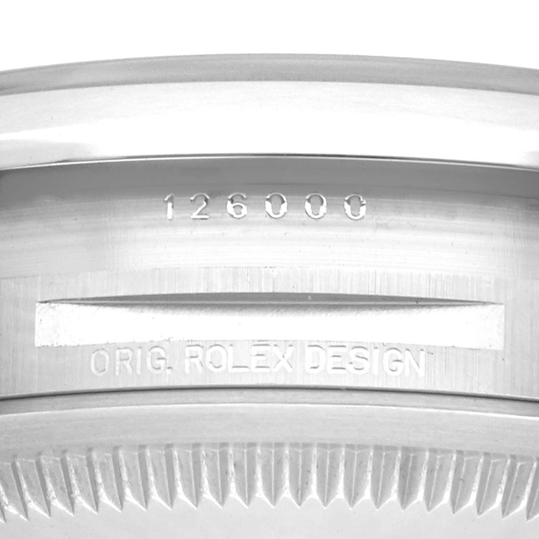 The image shows a close-up of the case back edge with engravings on the Rolex Oyster Perpetual 126000 Men
s Stainless Steel Pink Dial.