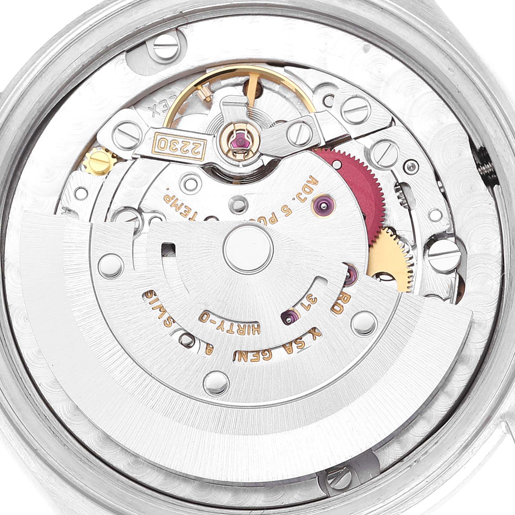 The image shows an internals view of a Rolex Mid-Size 77080 Women's Stainless Steel Pink Dial 77080 Women's Stainless Steel Pink Dial model watch, displaying its intricate movement and gears.