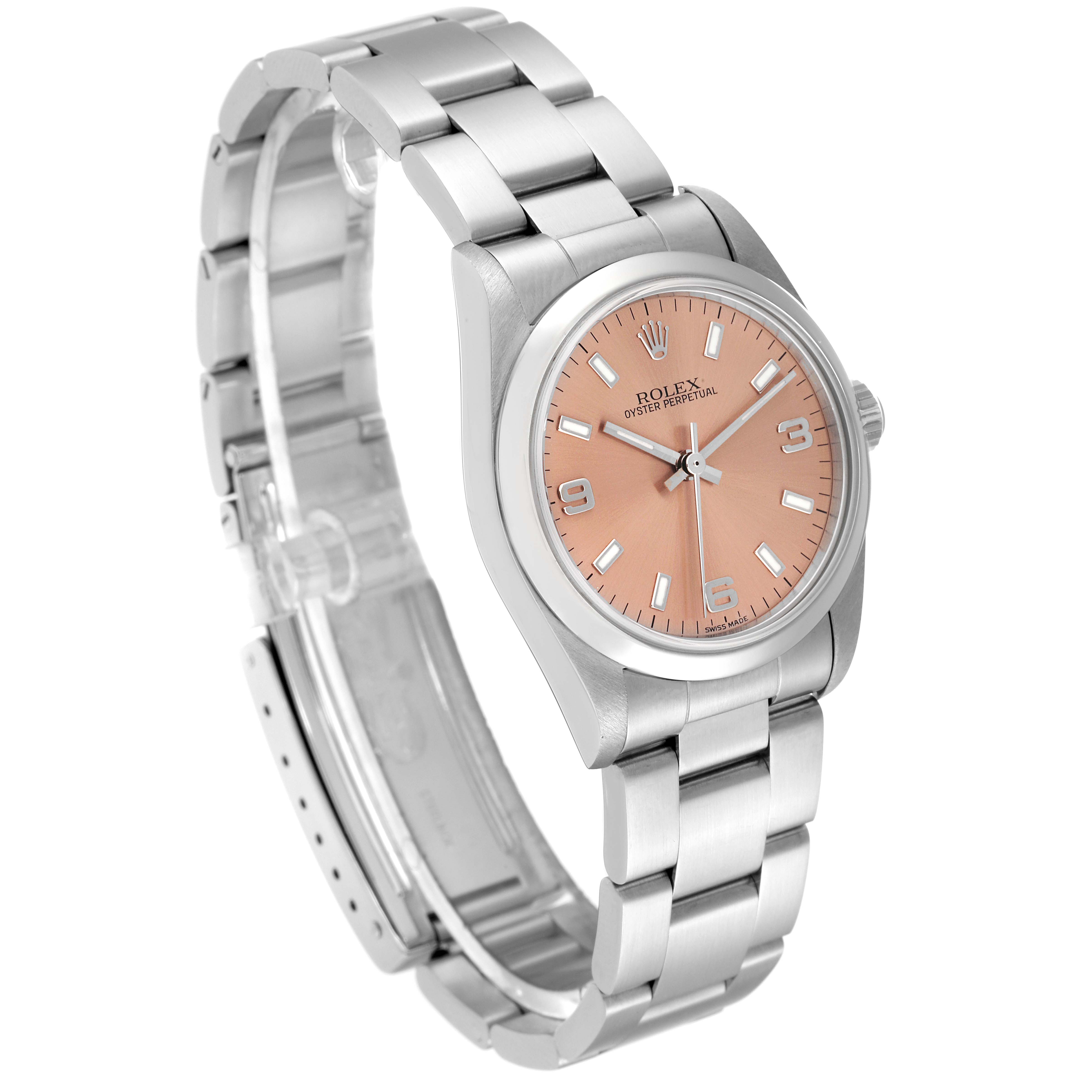 The image shows a mid-size Rolex Oyster Perpetual watch angled slightly to the side, displaying its face, bracelet, and clasp.