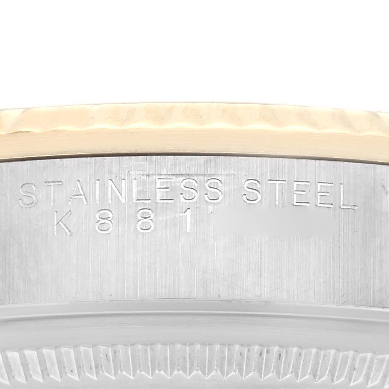 The image shows a close-up of the stainless steel back case of a Rolex Oyster Perpetual 14233 Men's Steel and Gold (two tone) Silver Dial 14233 Men's Steel and Gold (two tone) Silver Dial watch.