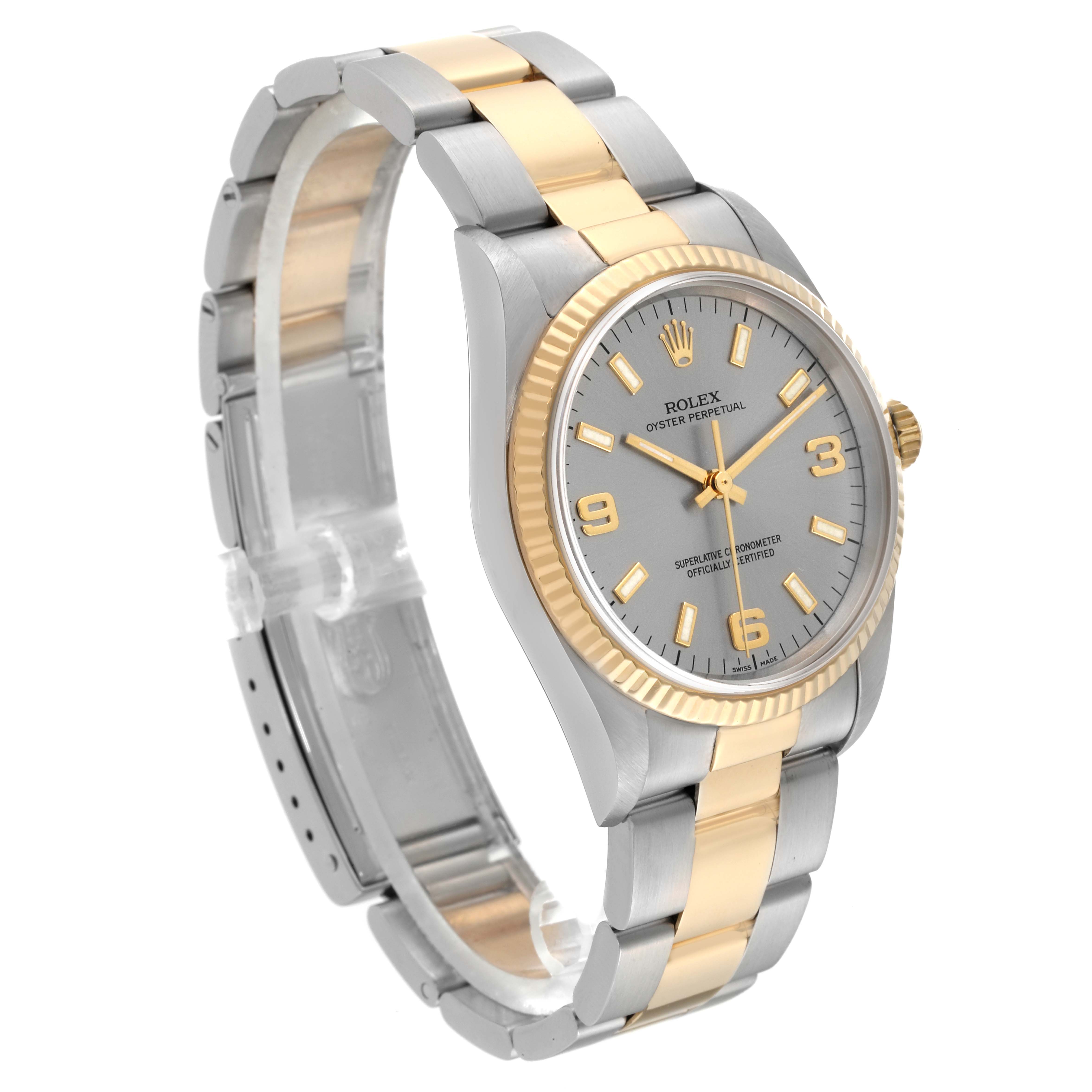 The Rolex Oyster Perpetual 14233 Men's Steel and Gold (two tone) Silver Dial 14233 Men's Steel and Gold (two tone) Silver Dial watch is shown at a three-quarter angle, highlighting its two-tone bracelet, grey dial, and gold bezel.