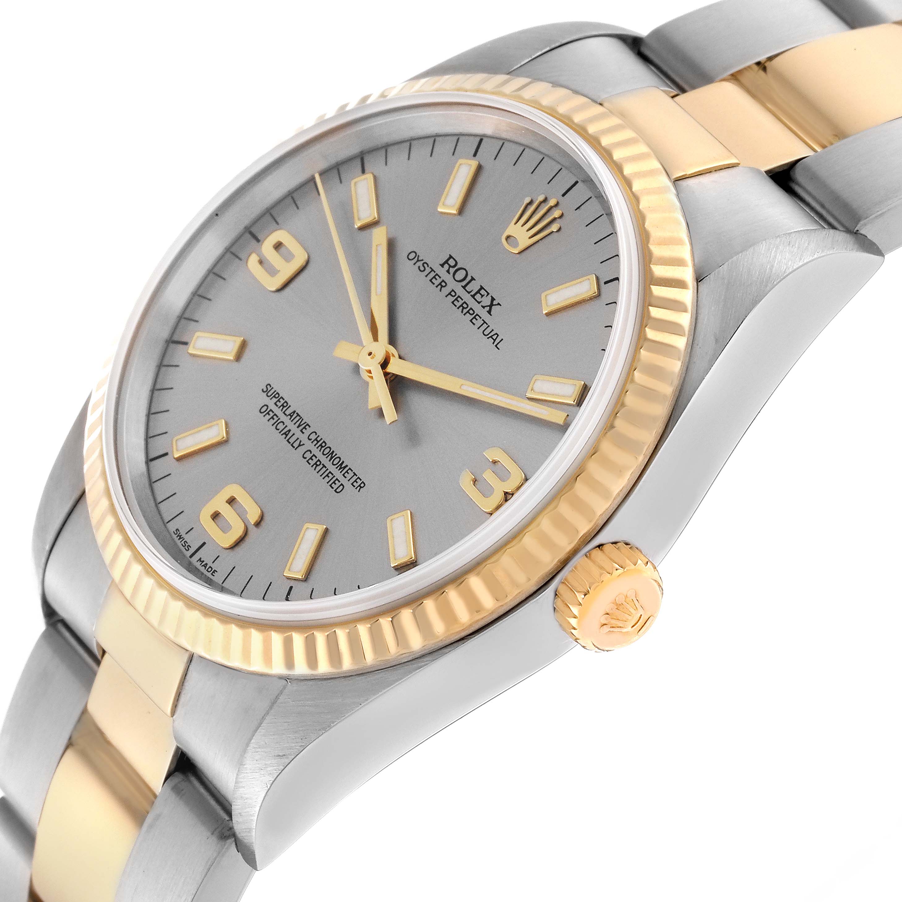 This image shows a close-up angle of the Rolex Oyster Perpetual 14233 Men's Steel and Gold (two tone) Silver Dial 14233 Men's Steel and Gold (two tone) Silver Dial watch, highlighting its face, bezel, crown, and part of the bracelet.