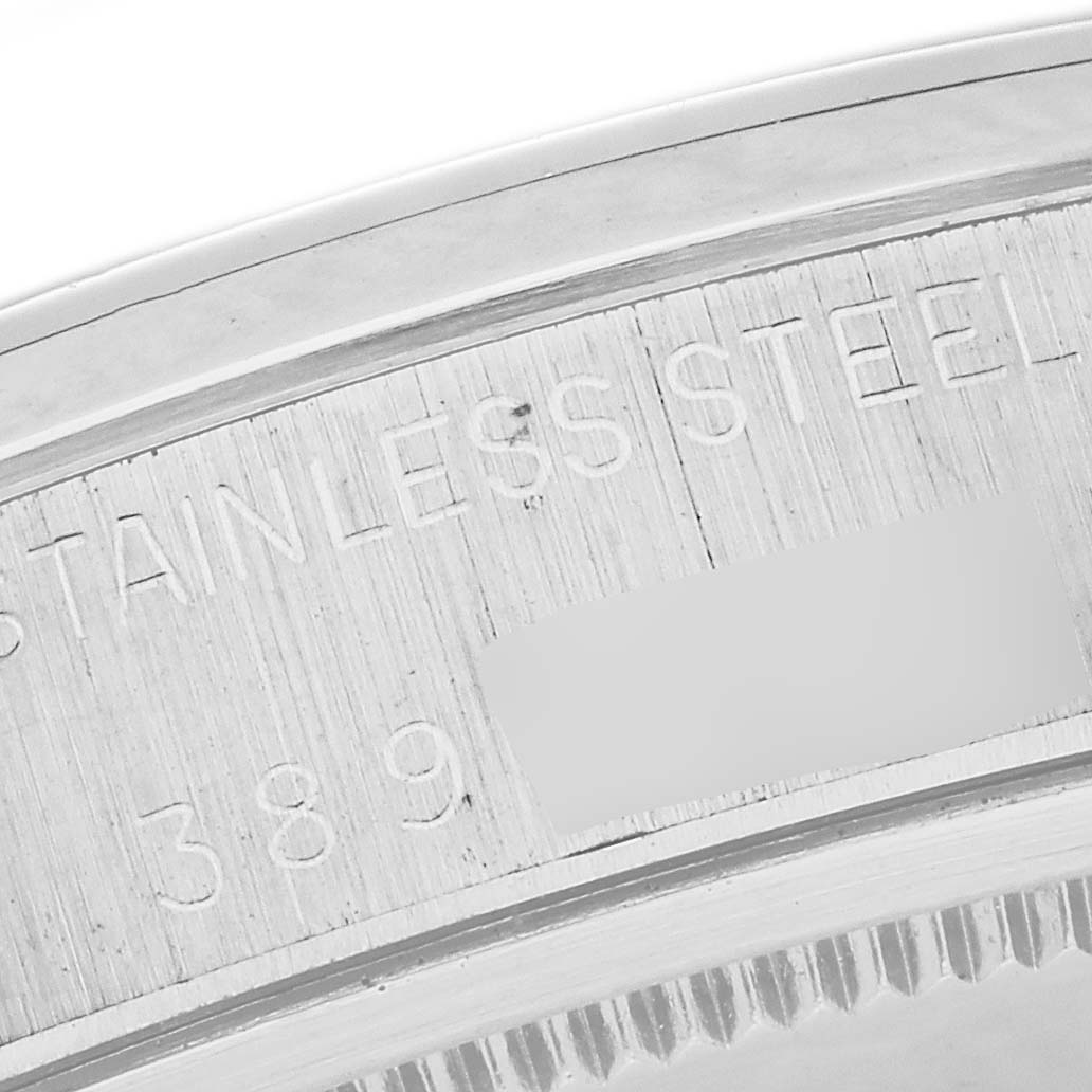 This image shows a close-up view of the case back of the Rolex Vintage Collection 6694 Men
s Stainless Steel Champagne Dial 6694 Men
s Stainless Steel Champagne Dial watch, highlighting the engraving and materials.