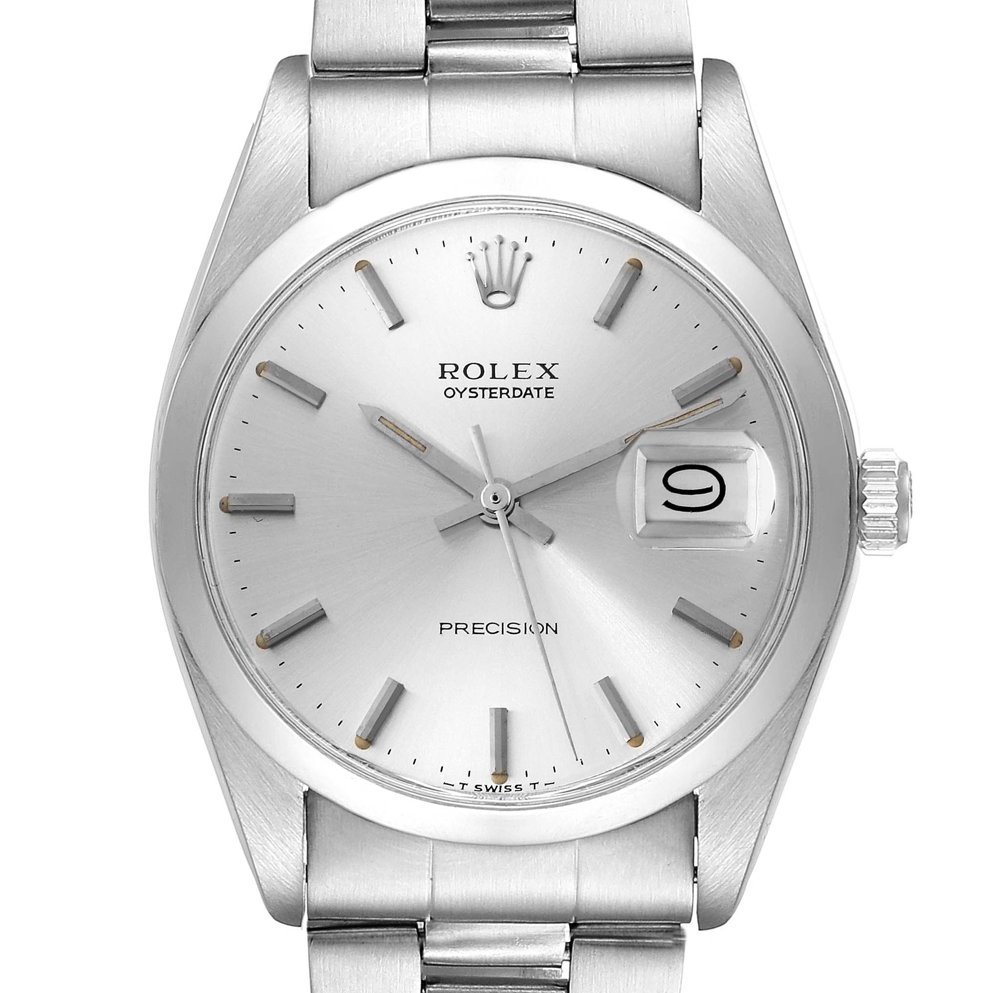 The image shows a frontal view of a Rolex Vintage Collection 6694 Men's Stainless Steel Silver Dial 6694 Men's Stainless Steel Silver Dial Oysterdate watch, highlighting its dial, hands, and date window.