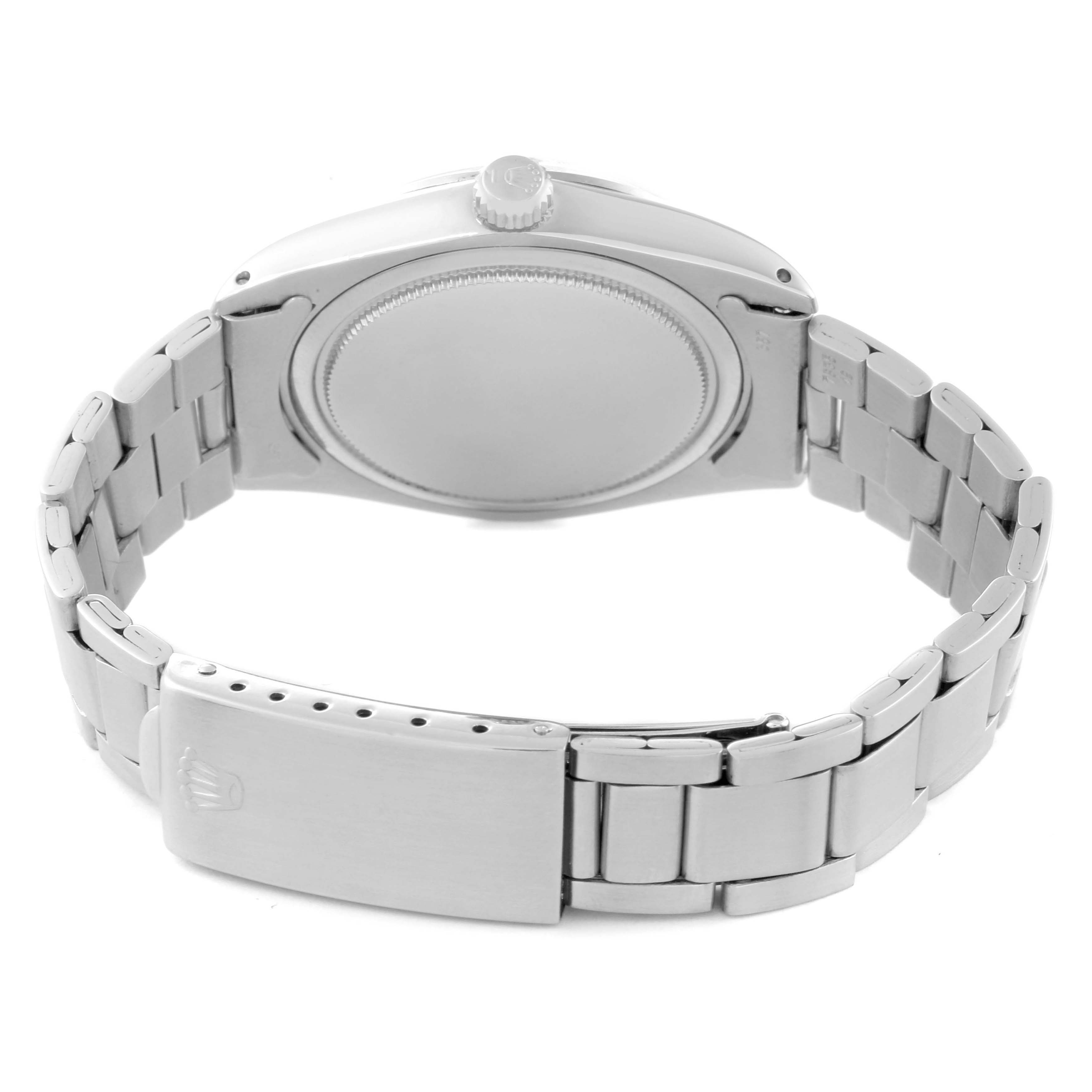 This image shows the back view of the Rolex Vintage Collection 6694 Men's Stainless Steel Silver Dial 6694 Men's Stainless Steel Silver Dial watch, including the case back, crown, and bracelet with clasp.