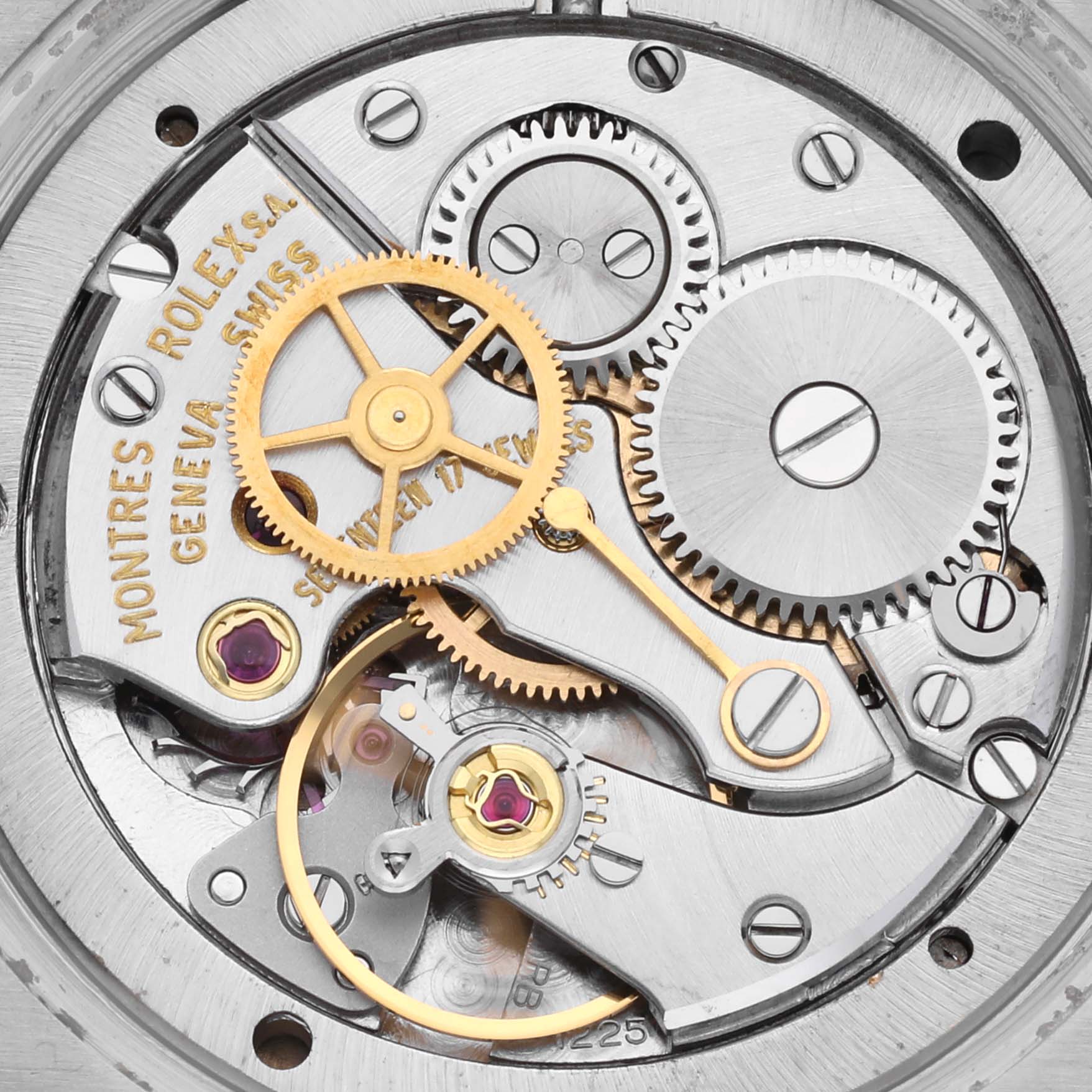 This image shows a close-up view of the mechanical movement inside a Rolex Vintage Collection 6694 Men's Stainless Steel Silver Dial 6694 Men's Stainless Steel Silver Dial watch.