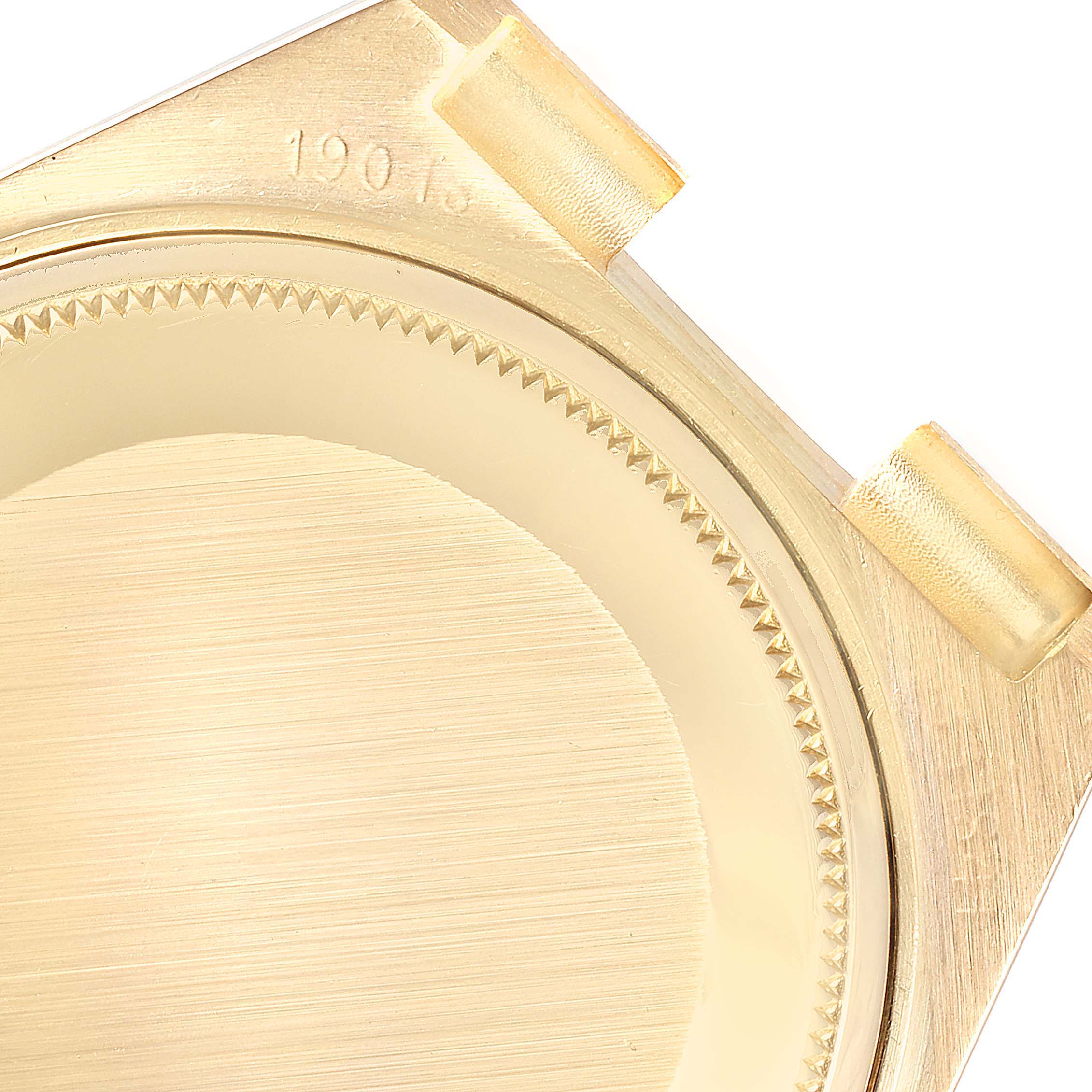 This image shows a close-up of the case back and lugs of a Rolex Oysterquartz 25260 Men
s Yellow Gold Champagne Dial 25260 Men
s Yellow Gold Champagne Dial watch.