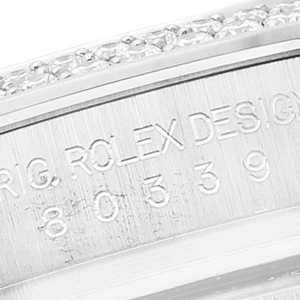 The image shows a close-up angle of the side engraving on the bezel of a Rolex Pearlmaster 80339 Women
s White Gold Mother of Pearl Dial 80339 Women
s White Gold Mother of Pearl Dial watch.