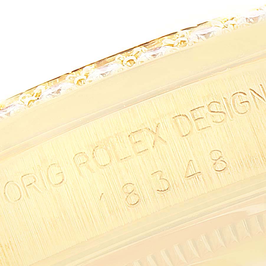 This close-up angle shows the engraving on the outer edge of the case back of a Rolex President 18348 Men
s Yellow Gold Champagne Dial 18348 Men
s Yellow Gold Champagne Dial model watch.