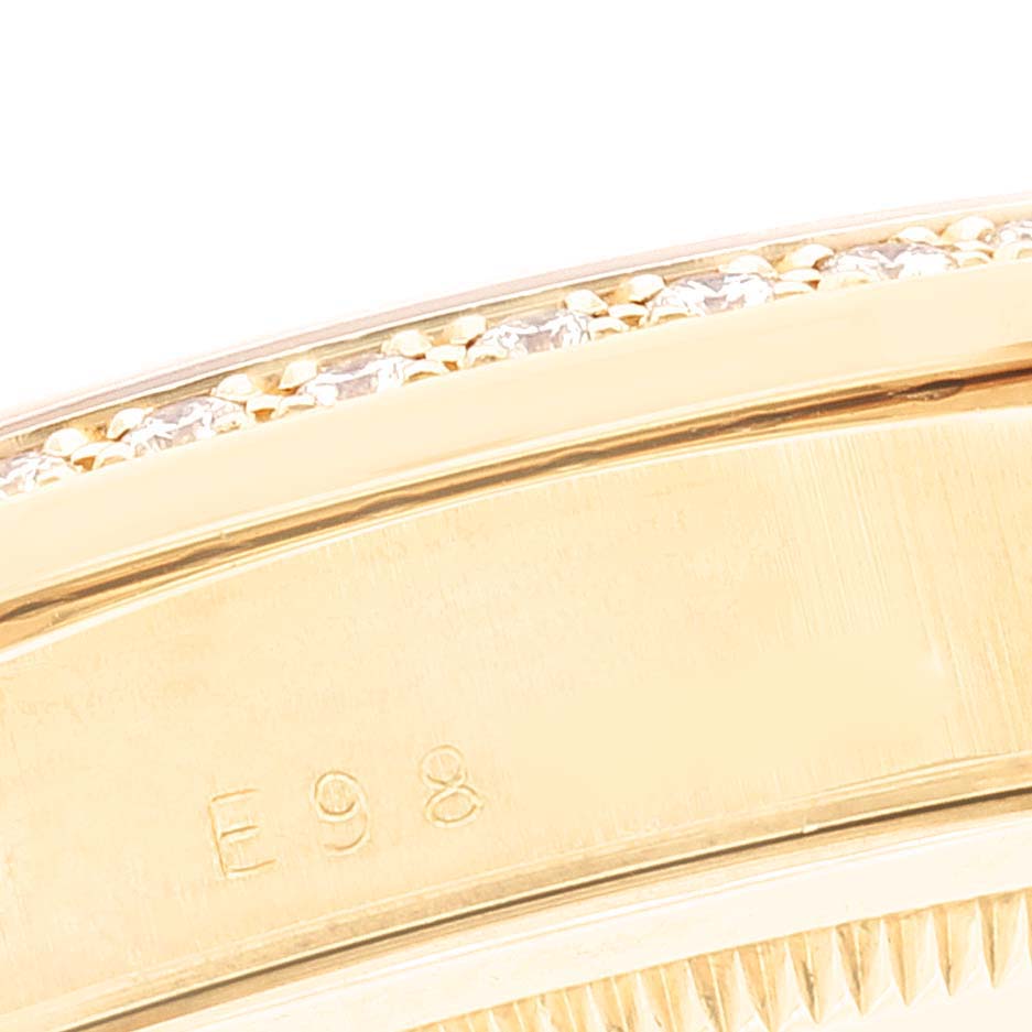 This close-up image shows the side view of the bezel and part of the case of a Rolex President 18348 Men
s Yellow Gold Champagne Dial 18348 Men
s Yellow Gold Champagne Dial model watch.