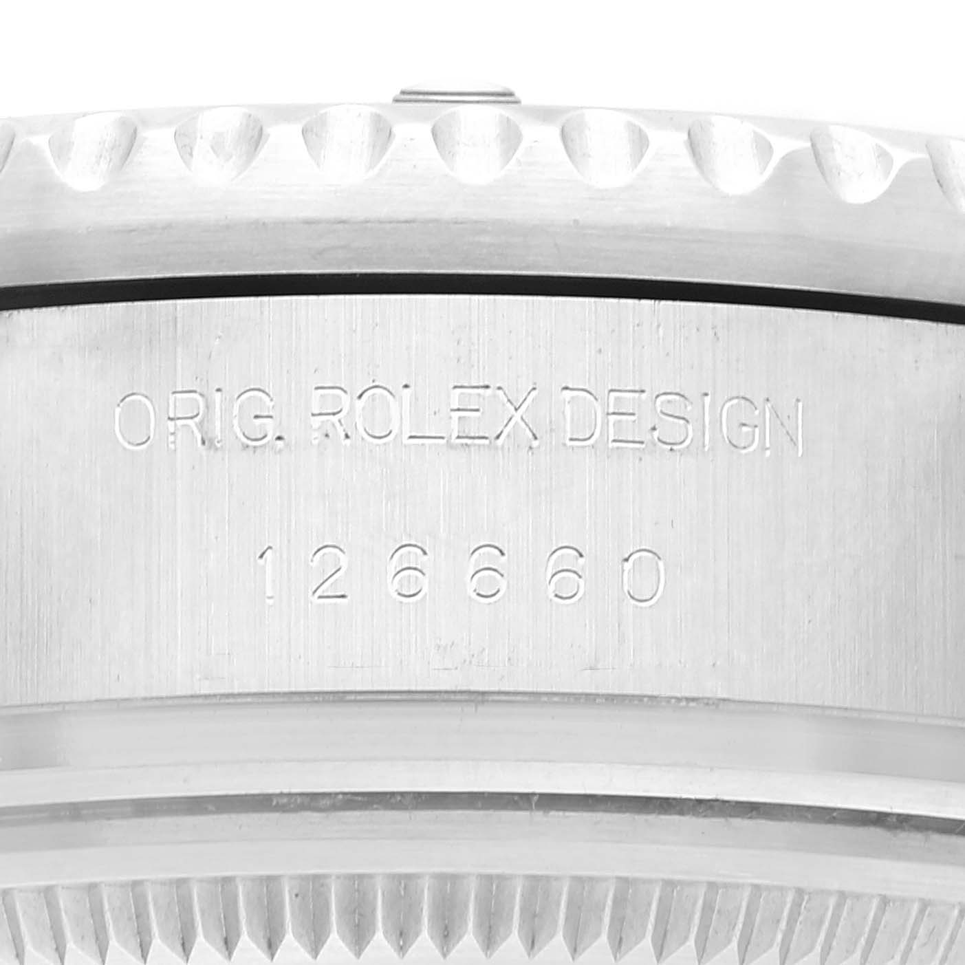 This image shows a close-up of the side of a Rolex Sea-Dweller 126660 Men
s Stainless Steel Black Dial 126660 Men
s Stainless Steel Black Dial watch case, featuring the engraved text and model number 126660.