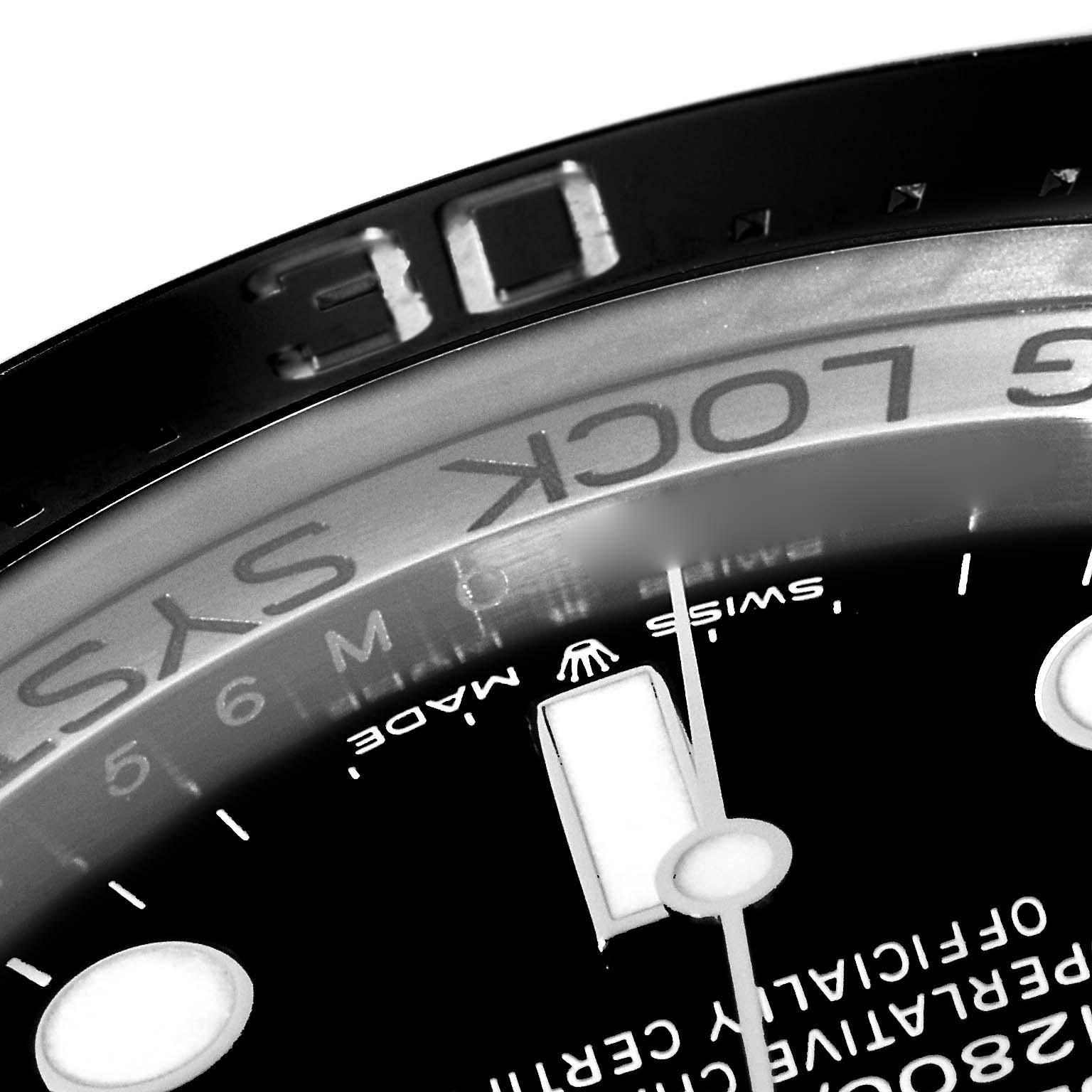 The image shows a close-up of the bezel and dial of a Rolex Sea-Dweller 126660 Men
s Stainless Steel Black Dial, highlighting the markings and indices.
