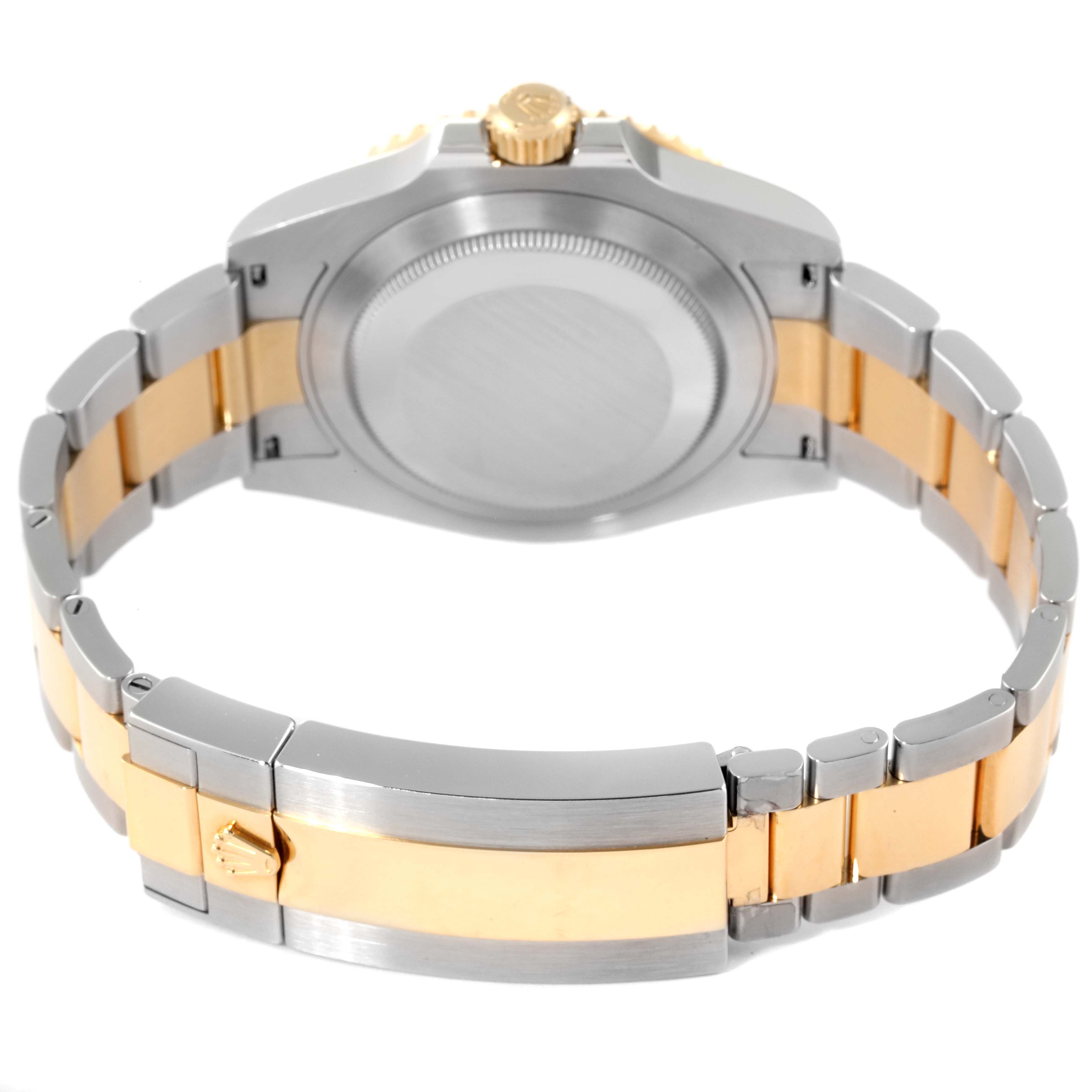 The image shows the back case and bracelet of a Rolex Submariner 126613 Men
s Steel and Gold (two tone) Blue Dial 126613 Men
s Steel and Gold (two tone) Blue Dial, highlighting its two-tone metal design.