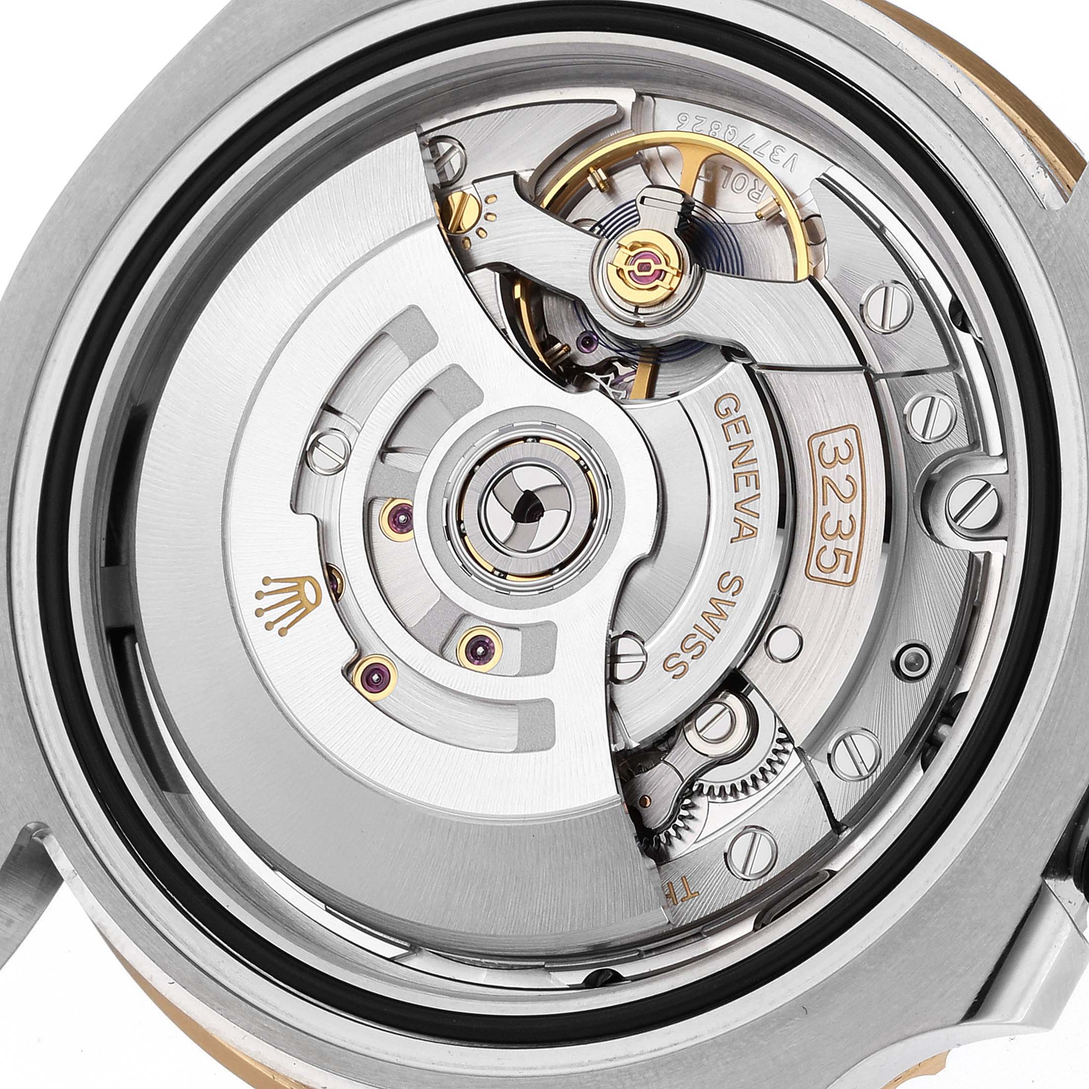 The image shows a close-up view of the movement mechanism of a Rolex Submariner 126613 Men's Steel and Gold (two tone) Blue Dial 126613 Men's Steel and Gold (two tone) Blue Dial, model 3235.