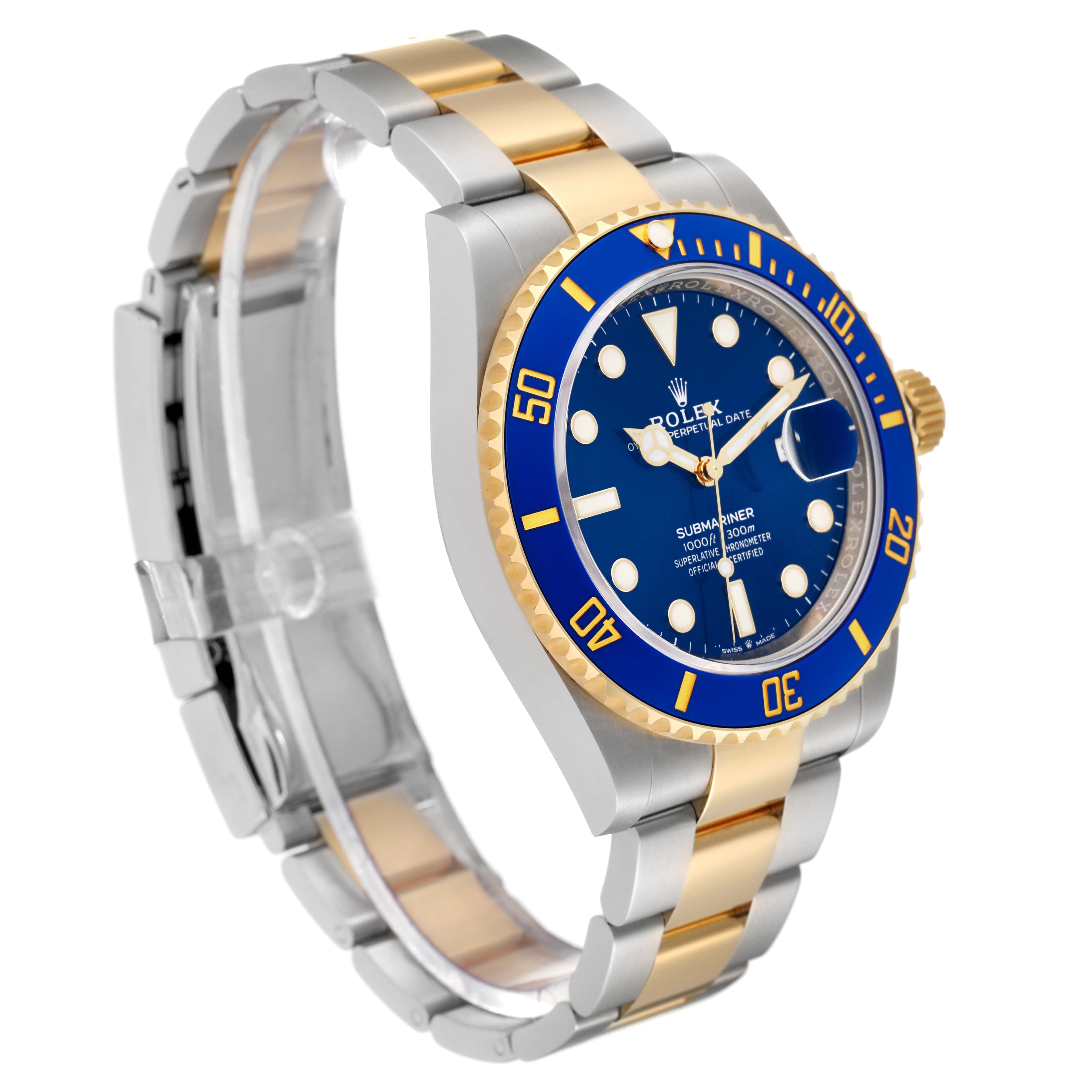 The image shows a Rolex Submariner 126613 Men's Steel and Gold (two tone) Blue Dial 126613 Men's Steel and Gold (two tone) Blue Dial watch at a right-side angle, displaying its blue dial, blue bezel, and two-tone bracelet.