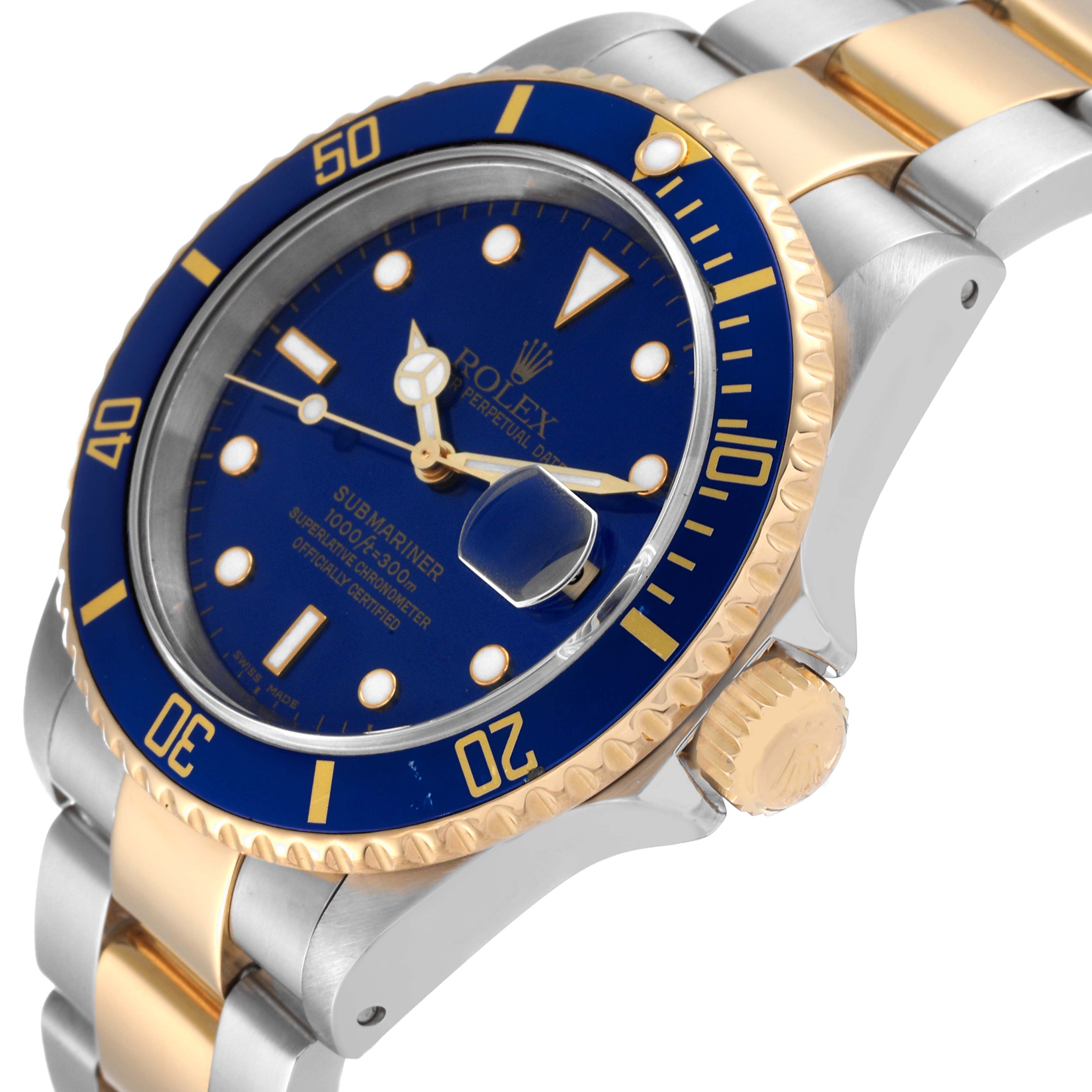 This image shows a close-up of the blue and gold Rolex Submariner 16613 Men's Steel and Gold (two tone) Blue Dial 16613 Men's Steel and Gold (two tone) Blue Dial, highlighting its dial, bezel, crown, and part of the bracelet.