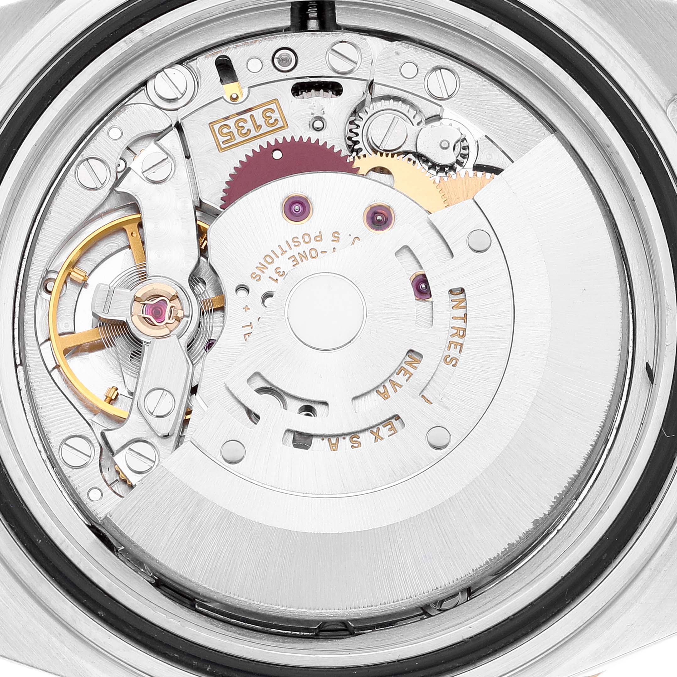 This image shows the intricate internal mechanics and movement parts of the Rolex Submariner 16613 Men's Steel and Gold (two tone) Blue Dial 16613 Men's Steel and Gold (two tone) Blue Dial watch viewed from the backside.