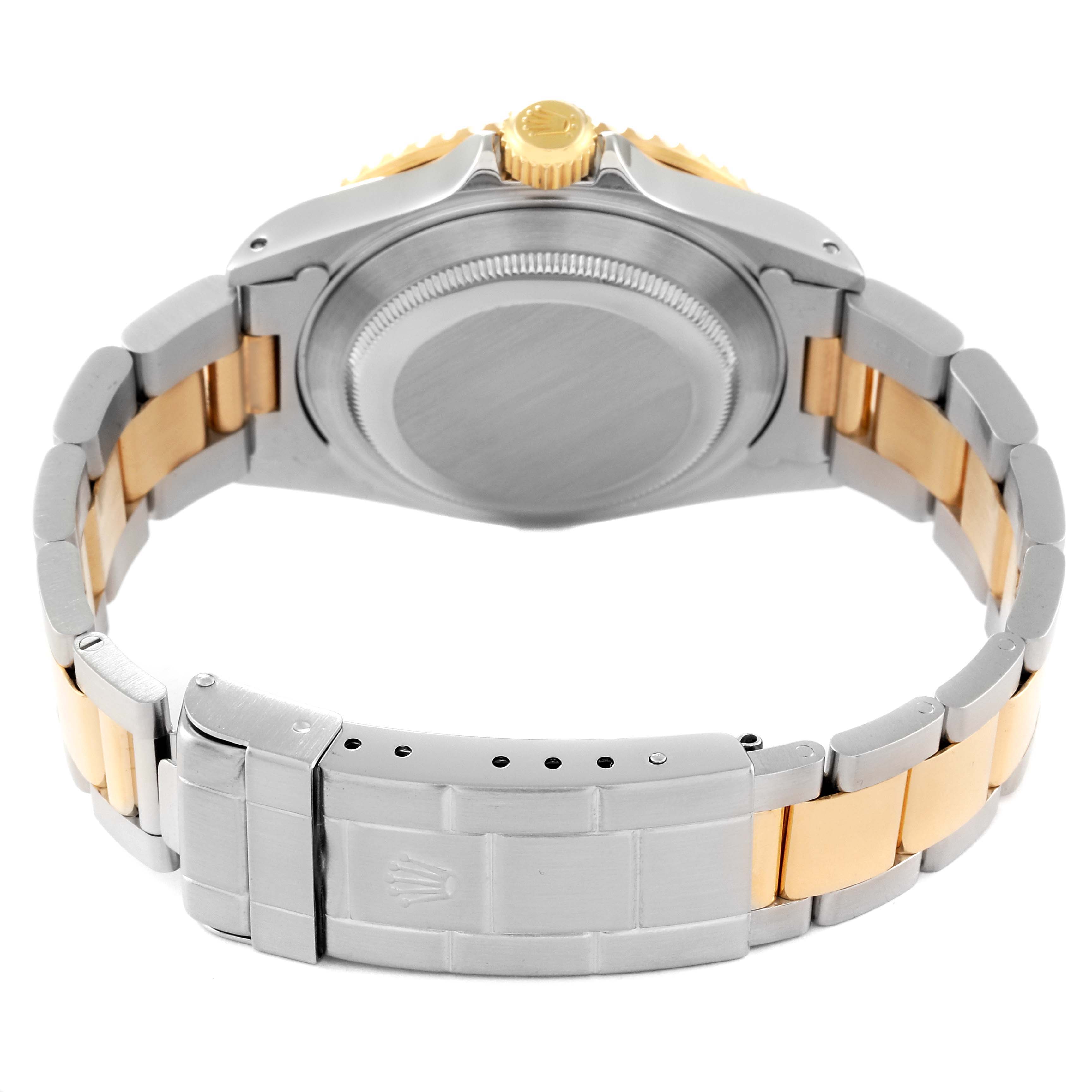 The image shows the back view of a Rolex Submariner 16613 Men's Steel and Gold (two tone) Blue Dial 16613 Men's Steel and Gold (two tone) Blue Dial watch, highlighting the case back, bracelet, and clasp.