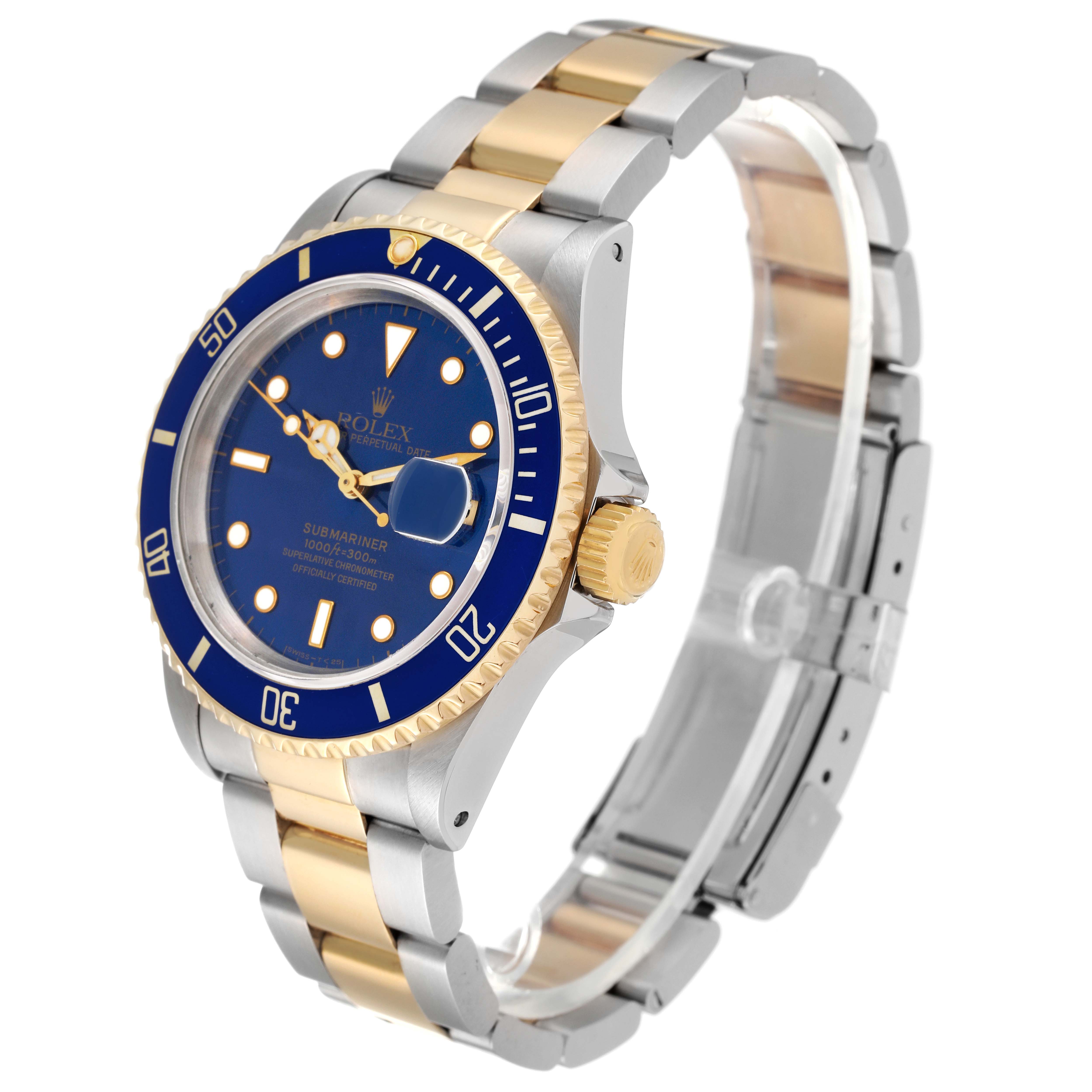 The image shows a Rolex Submariner 16613 Men's Steel and Gold (two tone) Blue Dial 16613 Men's Steel and Gold (two tone) Blue Dial watch at a three-quarter angle, highlighting the blue dial, bezel, and two-tone bracelet.