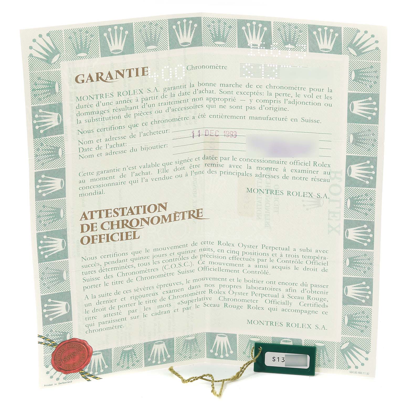 The image shows the official documents and warranty card for a Rolex Submariner 16613 Men's Steel and Gold (two tone) Blue Dial 16613 Men's Steel and Gold (two tone) Blue Dial watch.