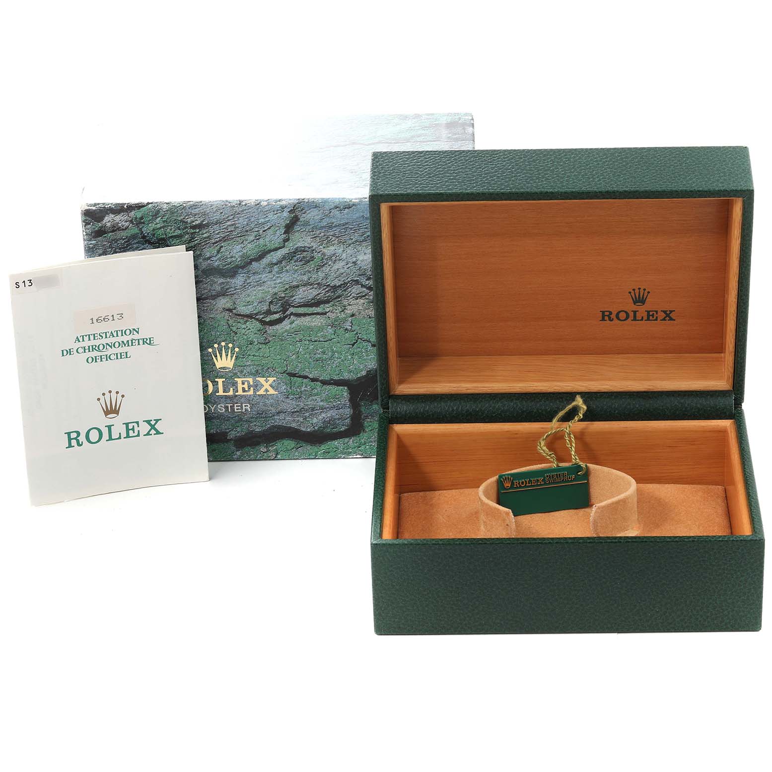 The image shows the open box, green tag, and documentation for a Rolex Submariner 16613 Men's Steel and Gold (two tone) Blue Dial 16613 Men's Steel and Gold (two tone) Blue Dial watch.