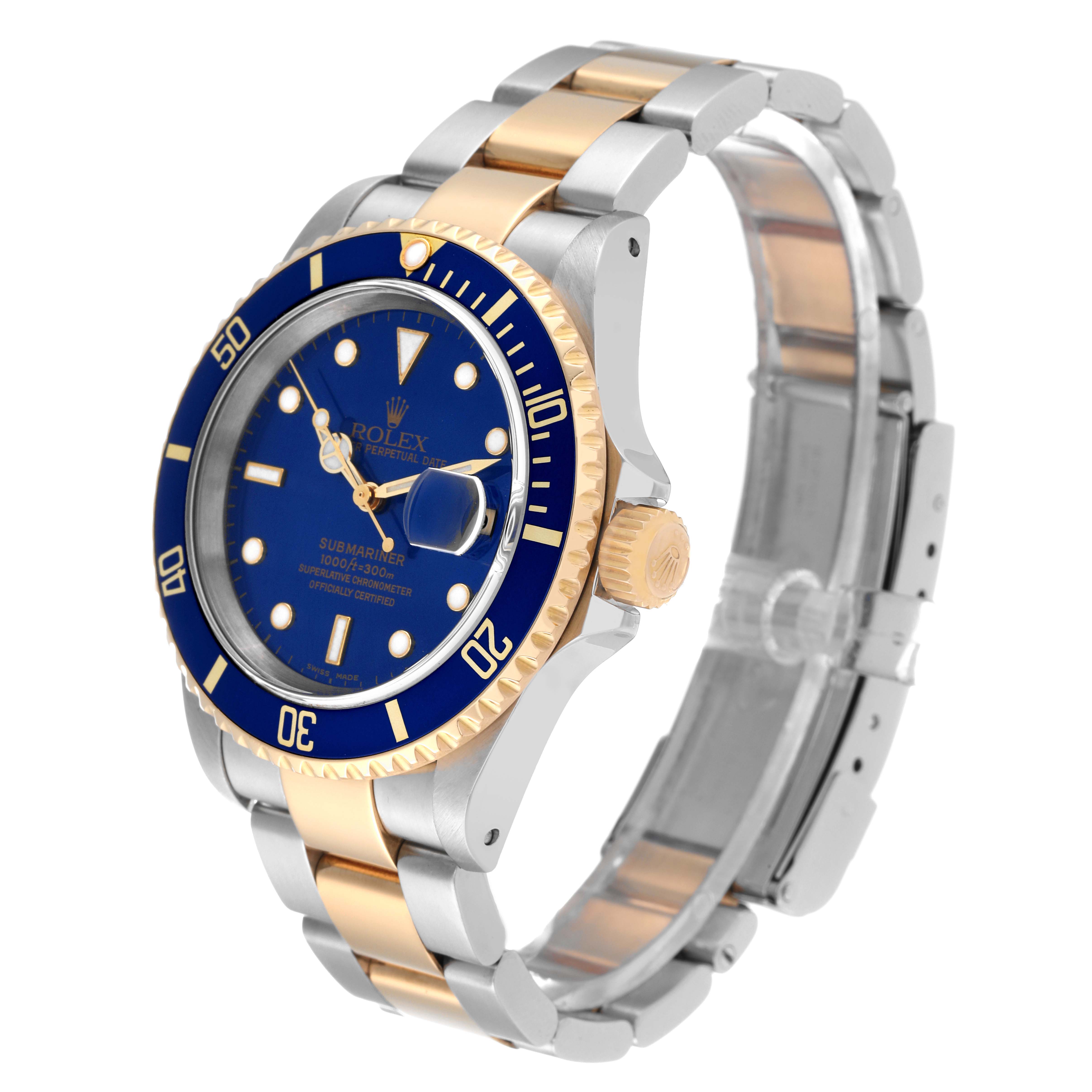 This image shows a Rolex Submariner 16613 Men's Steel and Gold (two tone) Black Dial 16613 Men's Steel and Gold (two tone) Black Dial watch at a three-quarter angle, highlighting the blue dial, bezel, and two-tone silver and gold bracelet.