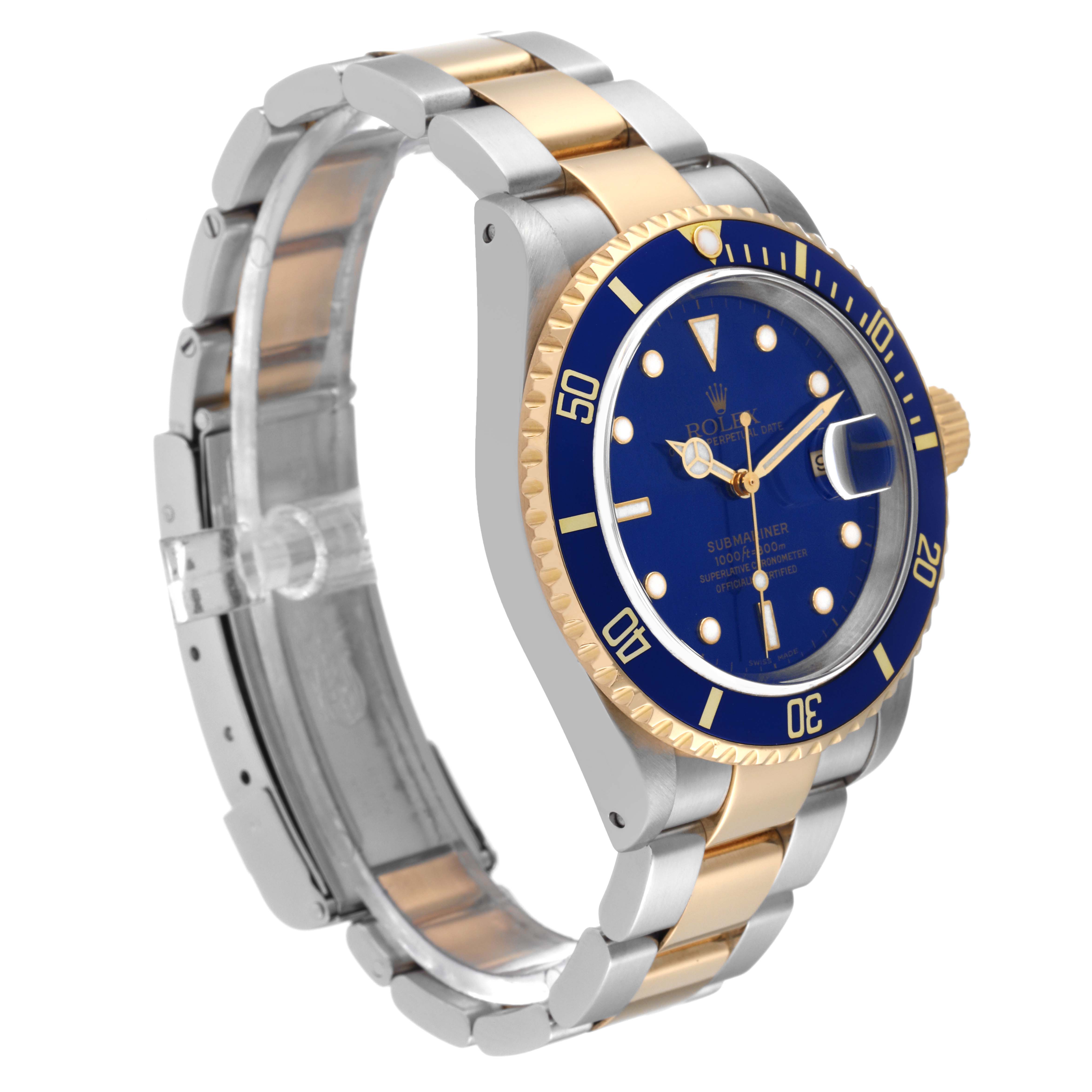 The image shows a Rolex Submariner 16613 Men's Steel and Gold (two tone) Black Dial 16613 Men's Steel and Gold (two tone) Black Dial at a slight side angle, highlighting its blue dial, gold bezel, and two-tone metal bracelet.