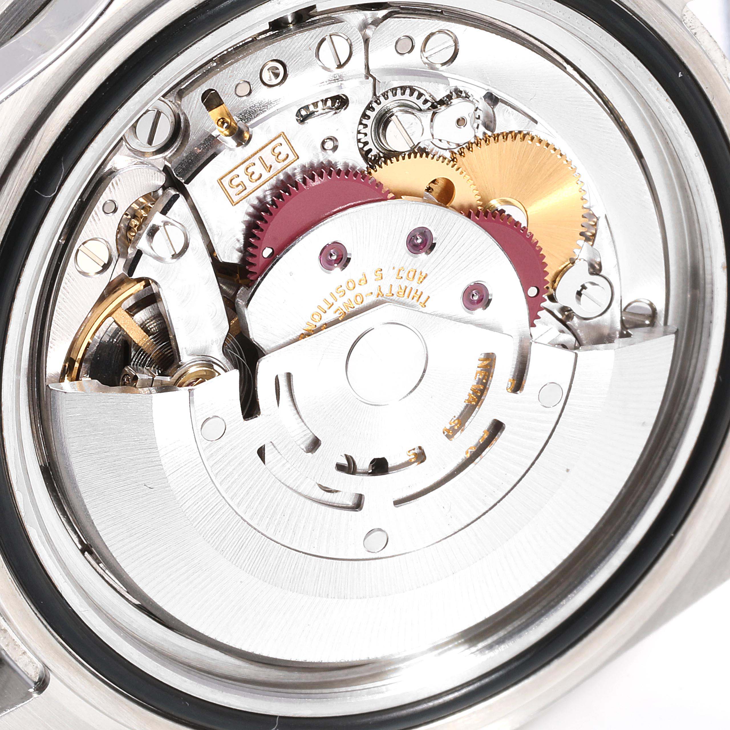 This image shows the intricate internal mechanics of the Rolex Submariner 16610 Men
s Stainless Steel Black Dial 16610 Men
s Stainless Steel Black Dial watch movement from a back-side angle.