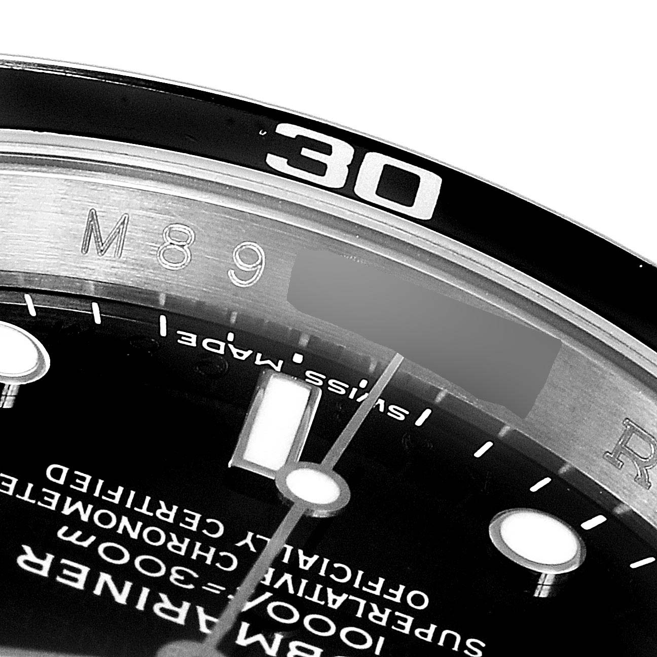 This image shows a close-up of the dial and bezel of the Rolex Submariner 16610 Men
s Stainless Steel Black Dial 16610 Men
s Stainless Steel Black Dial watch, focusing on the "30" minute mark.