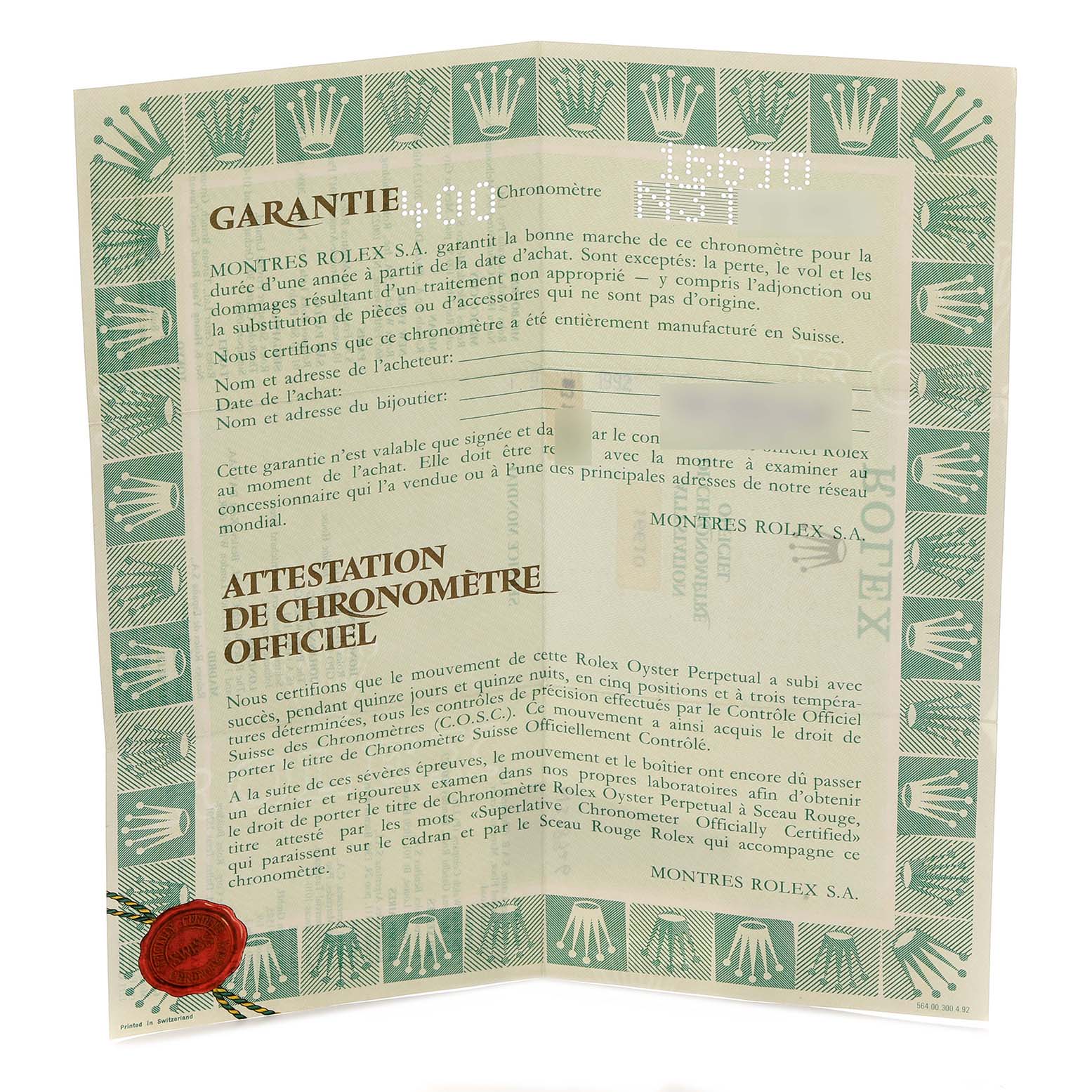 This image shows the warranty and chronometer certification document for a Rolex Submariner 16610 Men
s Stainless Steel Black Dial, displayed flat with visible text and logos.