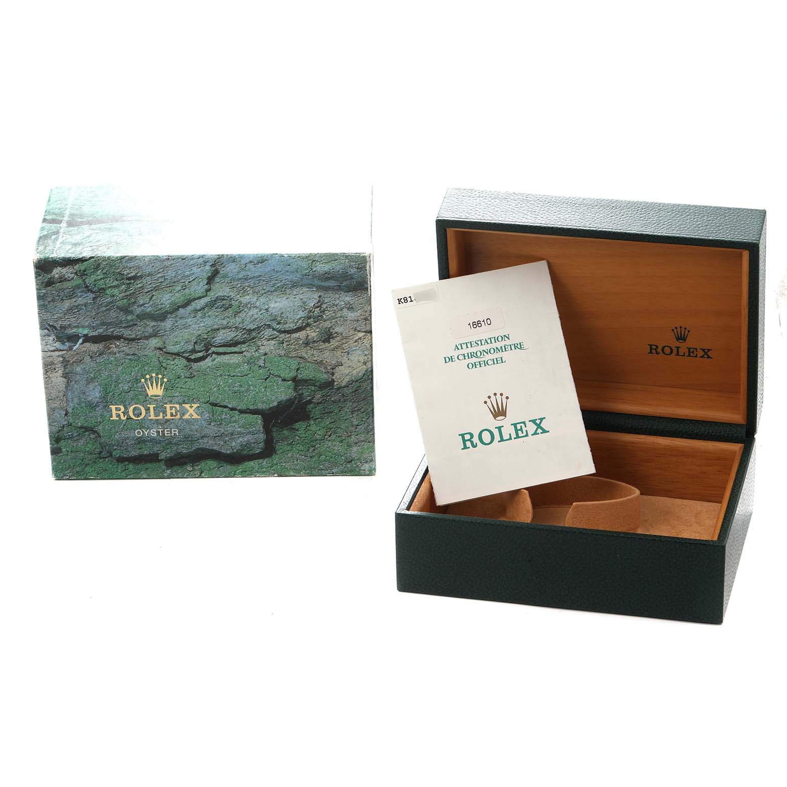 The image shows an open Rolex Submariner 16610 Men
s Stainless Steel Black Dial box at an angle revealing the interior and a booklet, alongside the outer box.