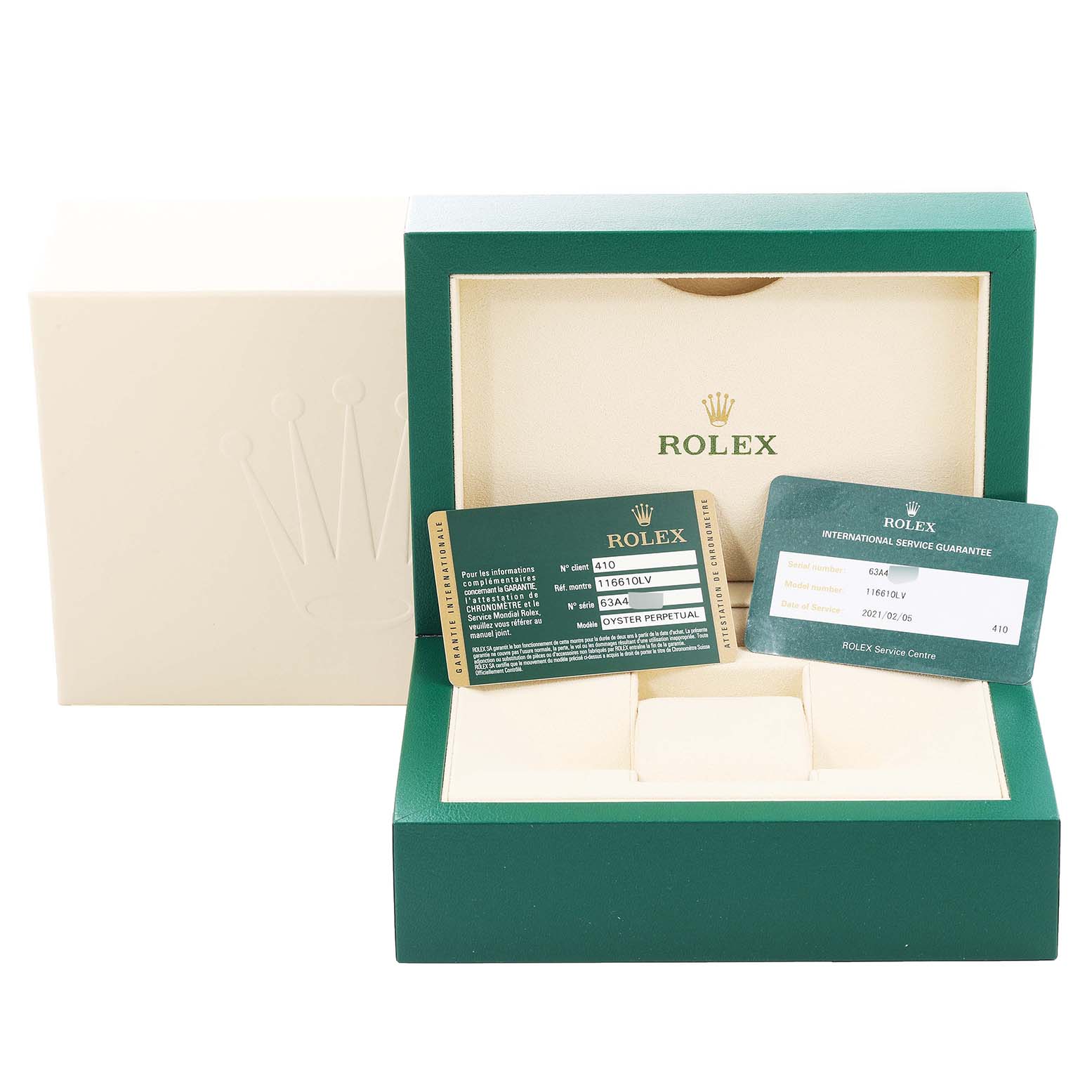The image shows a Rolex Submariner 116610LV Men
s Stainless Steel Green Dial 116610LV Men
s Stainless Steel Green Dial box with warranty and international guarantee cards inside.