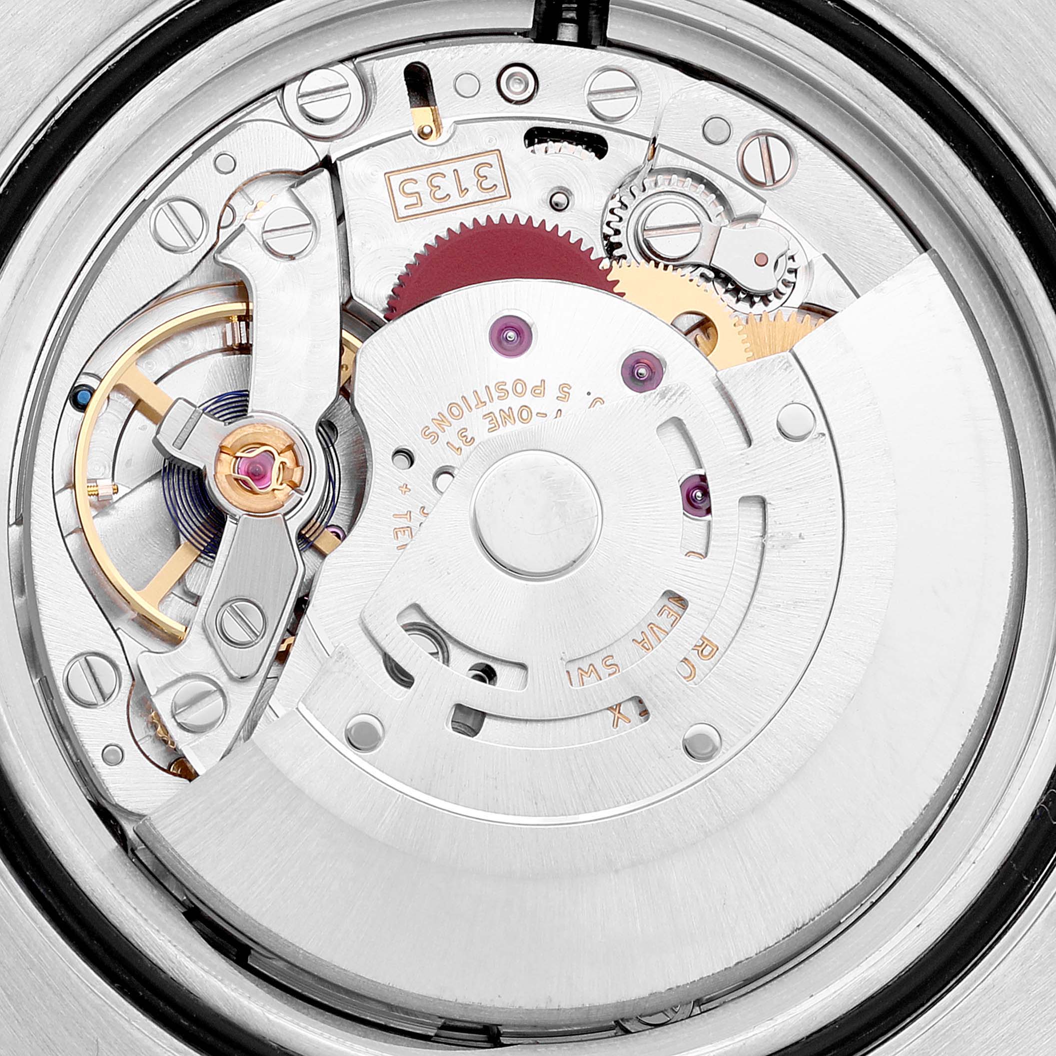 This is an image of the movement mechanism of a Rolex Submariner 116610LV Men
s Stainless Steel Green Dial 116610LV Men
s Stainless Steel Green Dial watch, shown from the back.