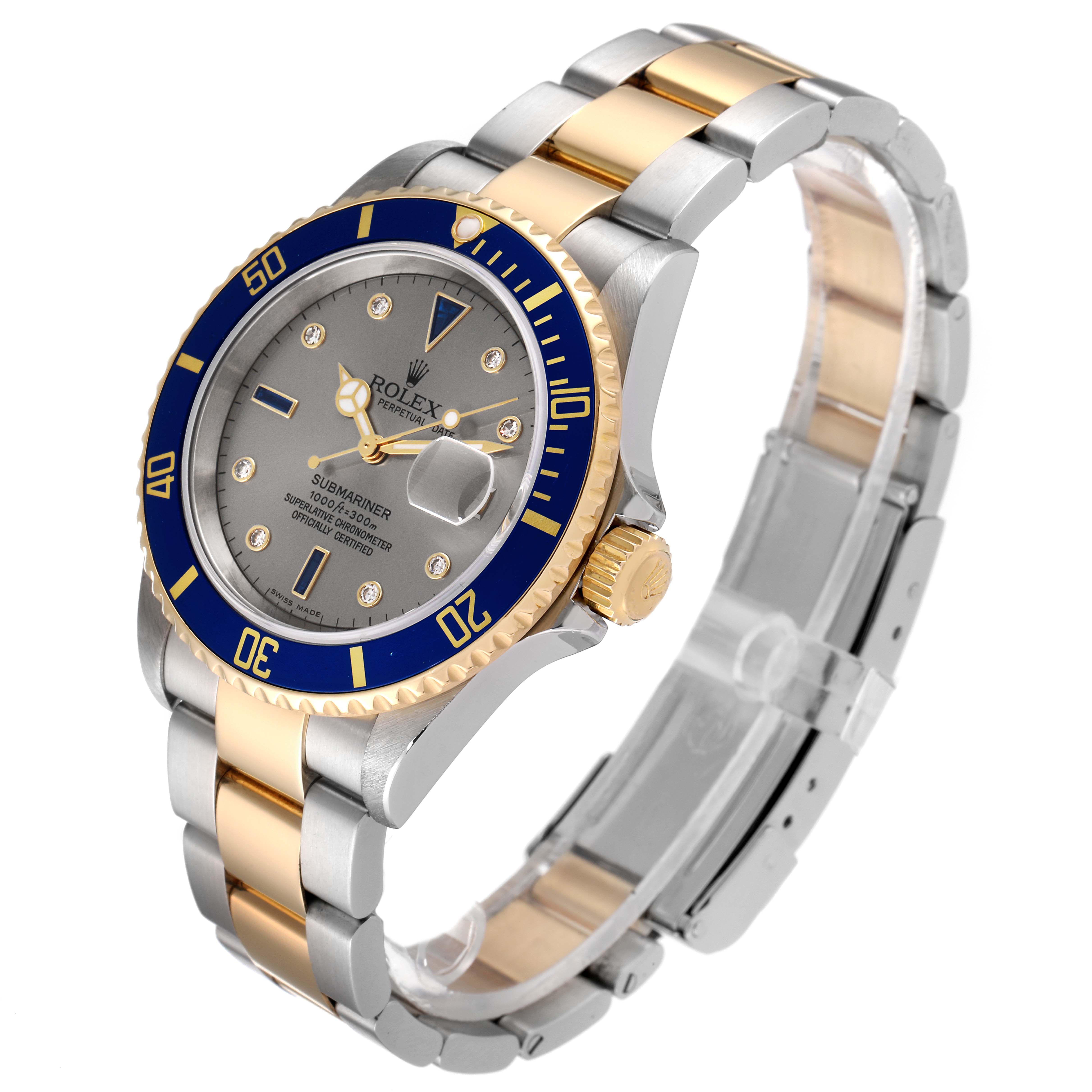 The Rolex Submariner 16613 Men's Steel and Gold (two tone) Silver Dial watch is shown at a three-quarter angle, highlighting the dial, bezel, case, and bracelet.