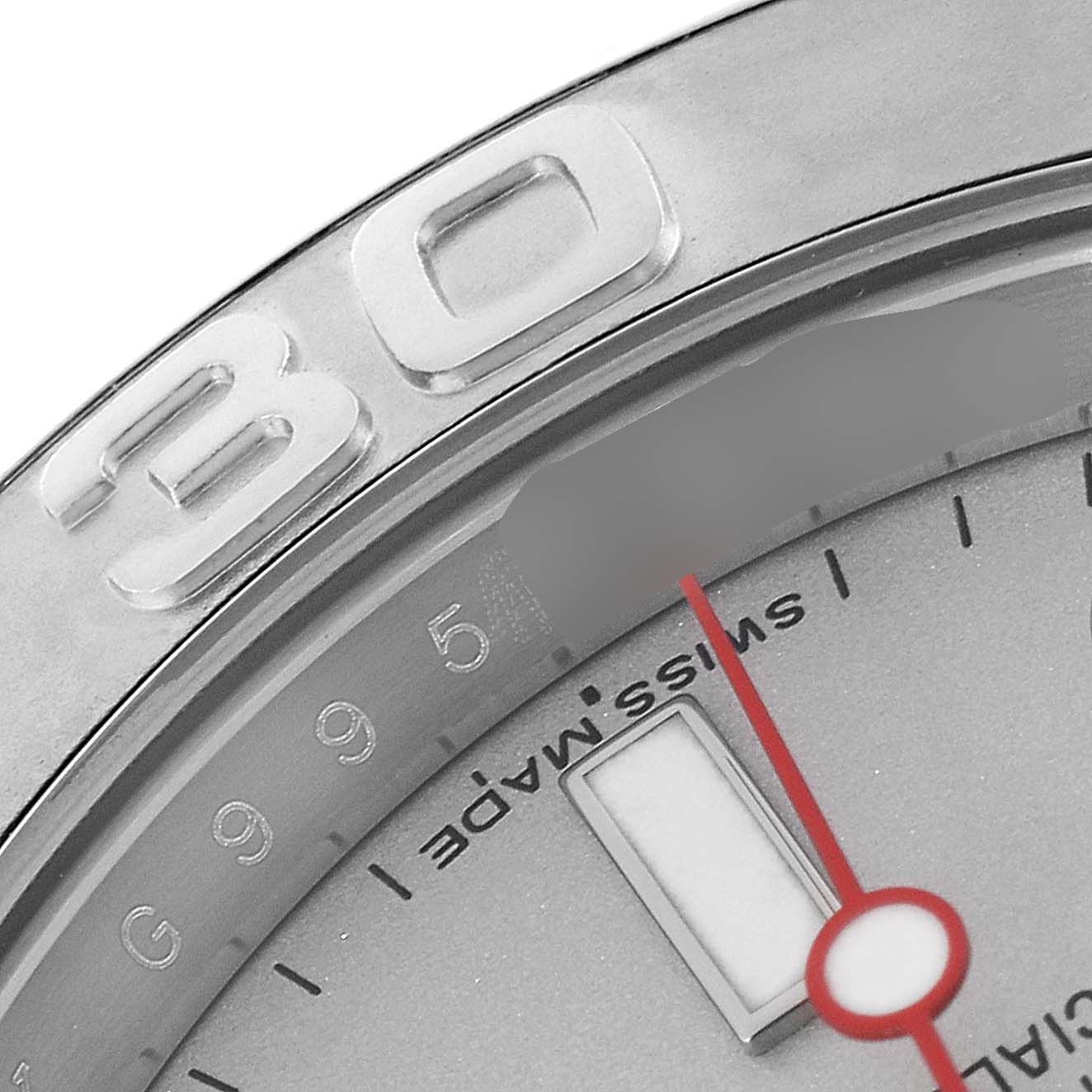 This close-up image shows the bezel, part of the dial, and the red seconds hand of a Rolex Yacht-Master 116622 Men's Stainless Steel Silver Dial 116622 Men's Stainless Steel Silver Dial watch.