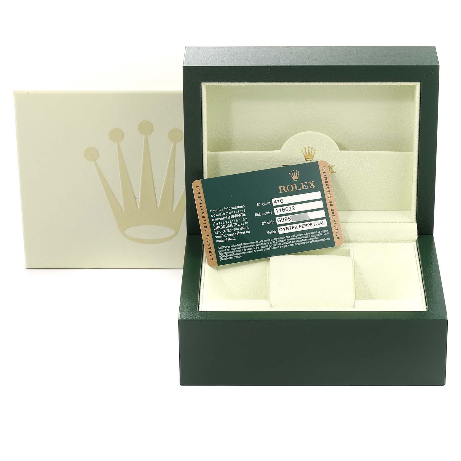 The image shows an open green Rolex watch box with the warranty card for the Yacht-Master model inside.