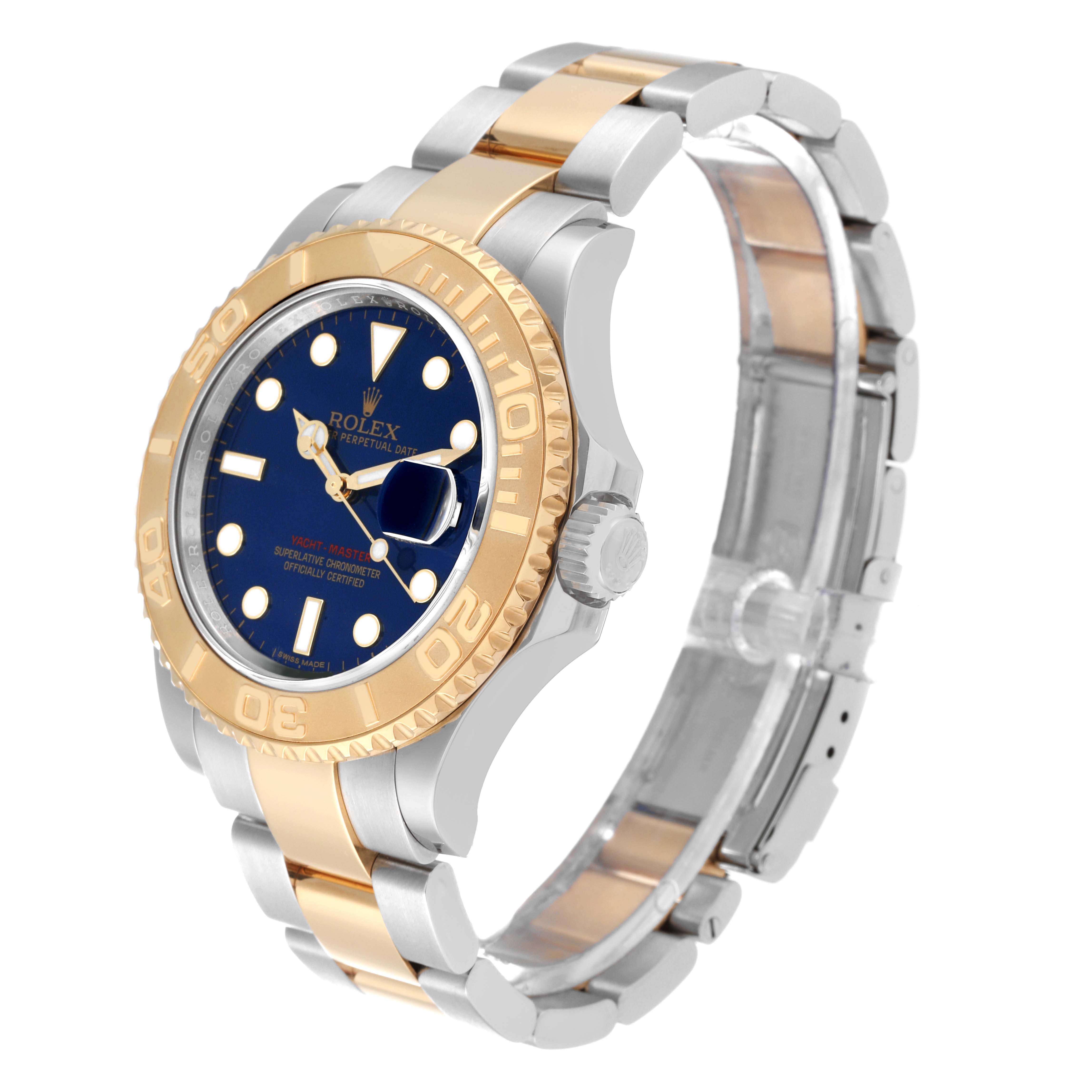 The image shows a side angle of a Rolex Yacht-Master 16623 Men's Steel and Gold (two tone) Blue Dial 16623 Men's Steel and Gold (two tone) Blue Dial watch, highlighting its dial, bezel, crown, and two-tone bracelet.
