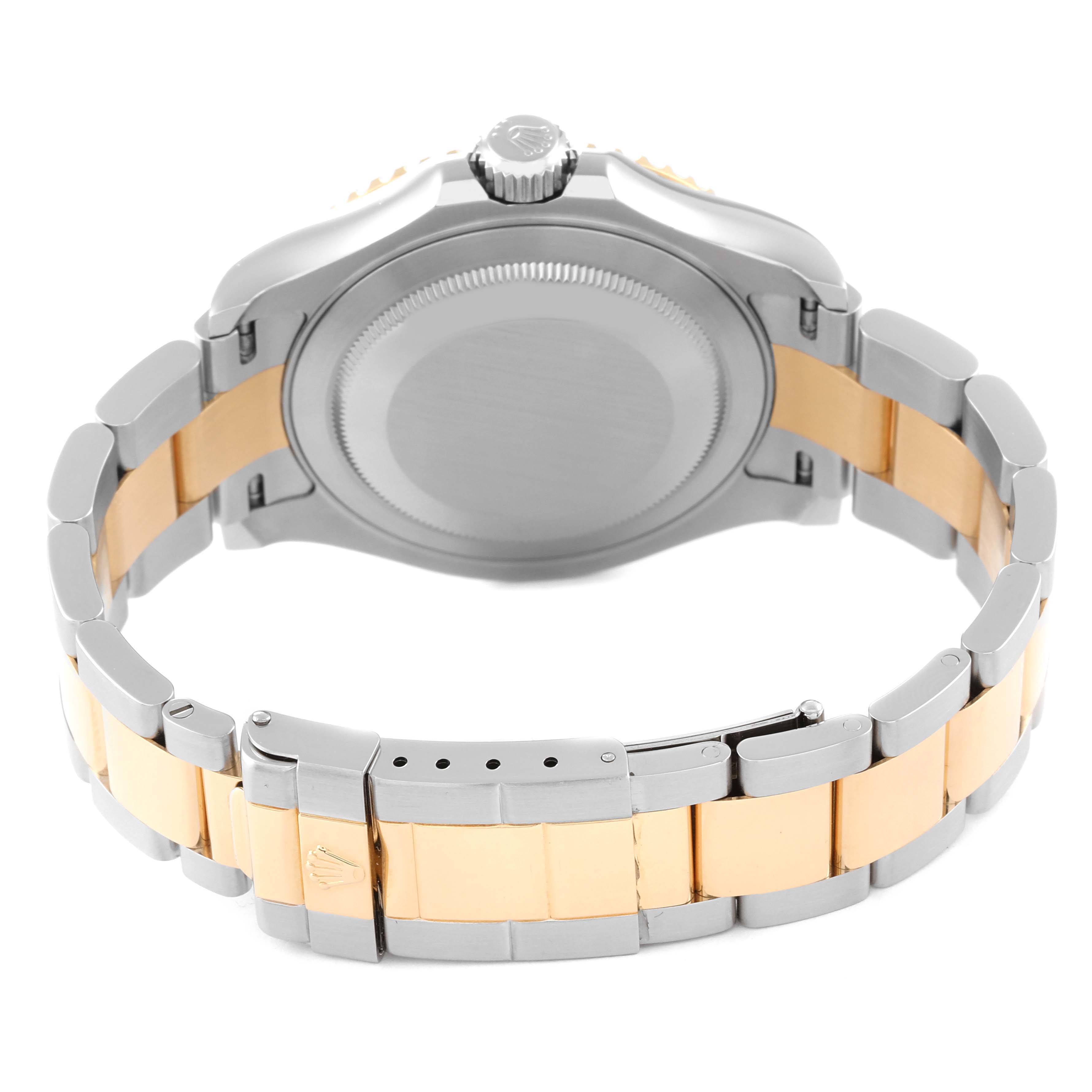 The image shows the back view of a Rolex Yacht-Master 16623 Men's Steel and Gold (two tone) Blue Dial 16623 Men's Steel and Gold (two tone) Blue Dial watch, focusing on its case back, crown, and the two-tone bracelet.