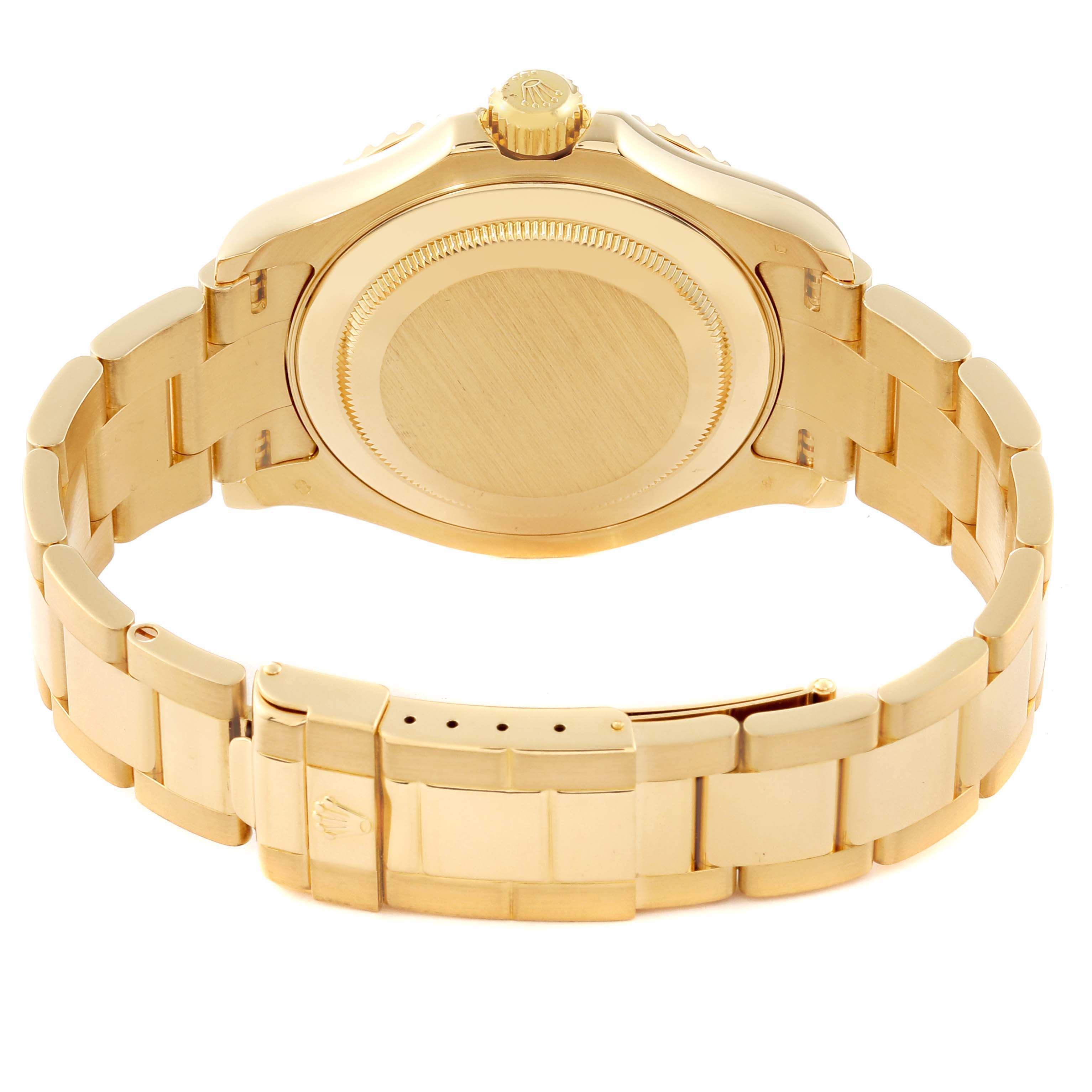 The image shows the back view of a Rolex Yacht-Master 16628 Men's Yellow Gold White Dial 16628 Men's Yellow Gold White Dial watch, highlighting its gold case, bracelet, and clasp.