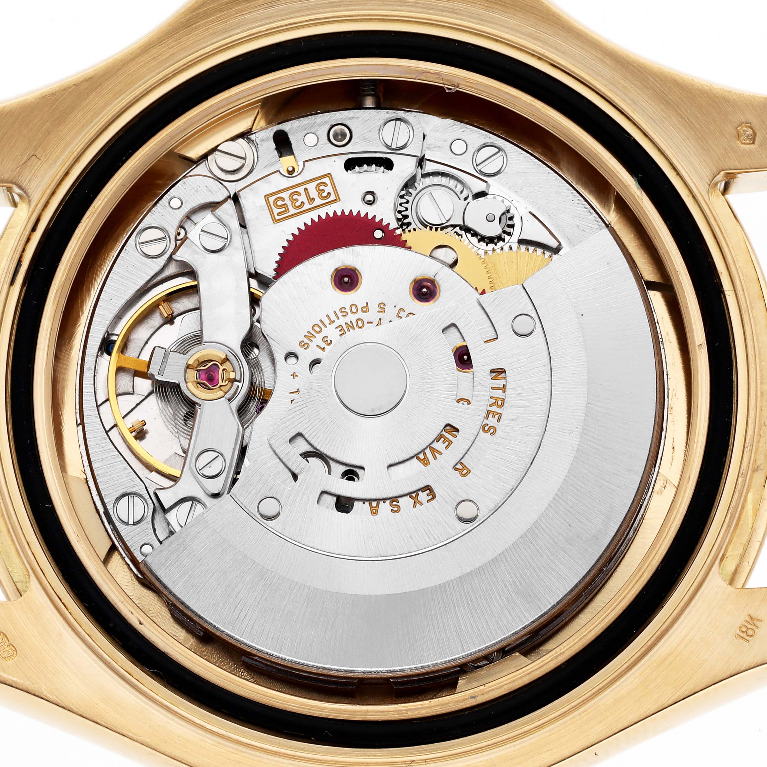 The image shows the internal movement of a Rolex Yacht-Master 16628 Men's Yellow Gold White Dial 16628 Men's Yellow Gold White Dial watch viewed from the back, highlighting its intricate components and mechanism.