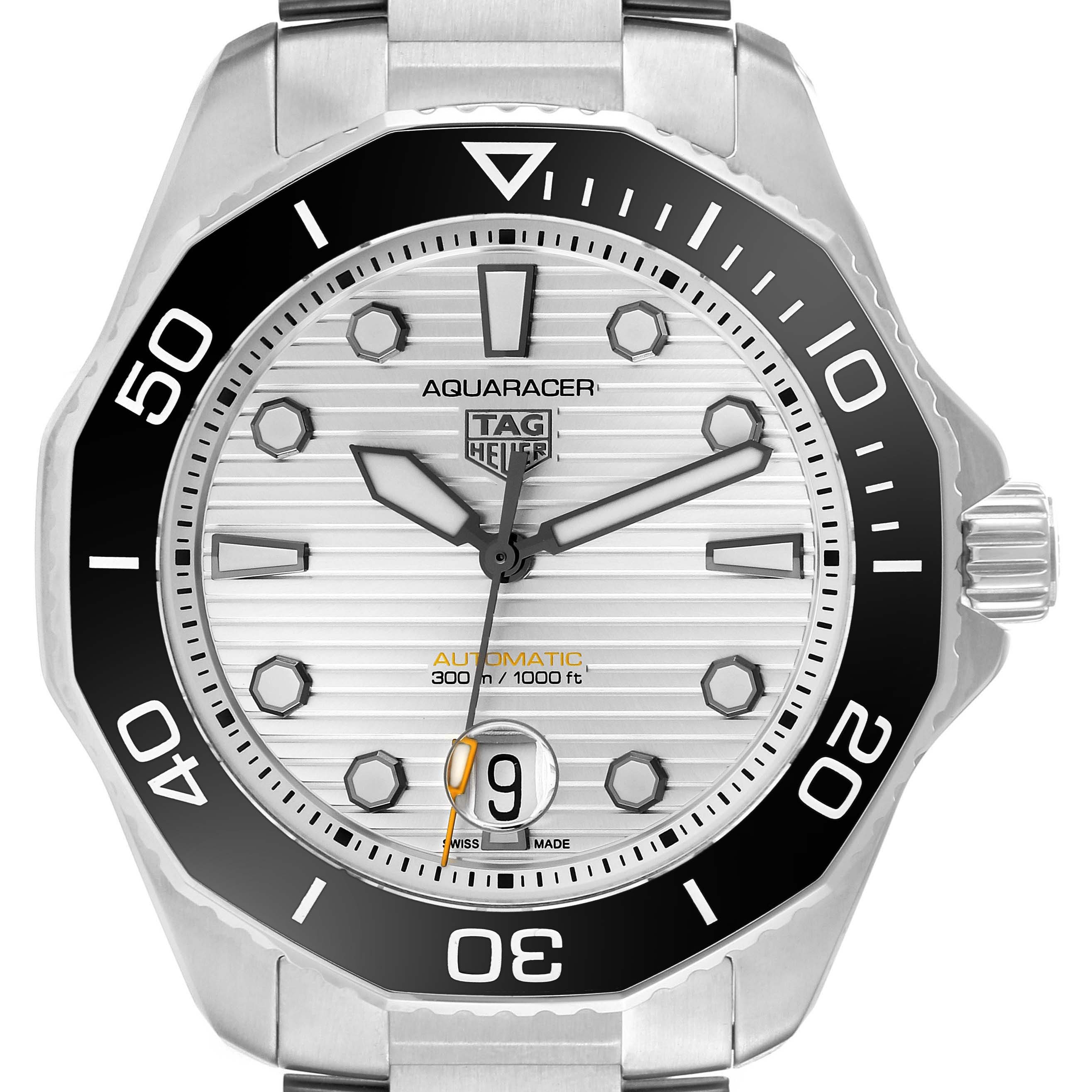 The image shows a close-up of the Tag Heuer Aquaracer WBP201C Men's Stainless Steel Silver Dial WBP201C Men's Stainless Steel Silver Dial watch face, featuring the bezel, hands, date window, and markers.