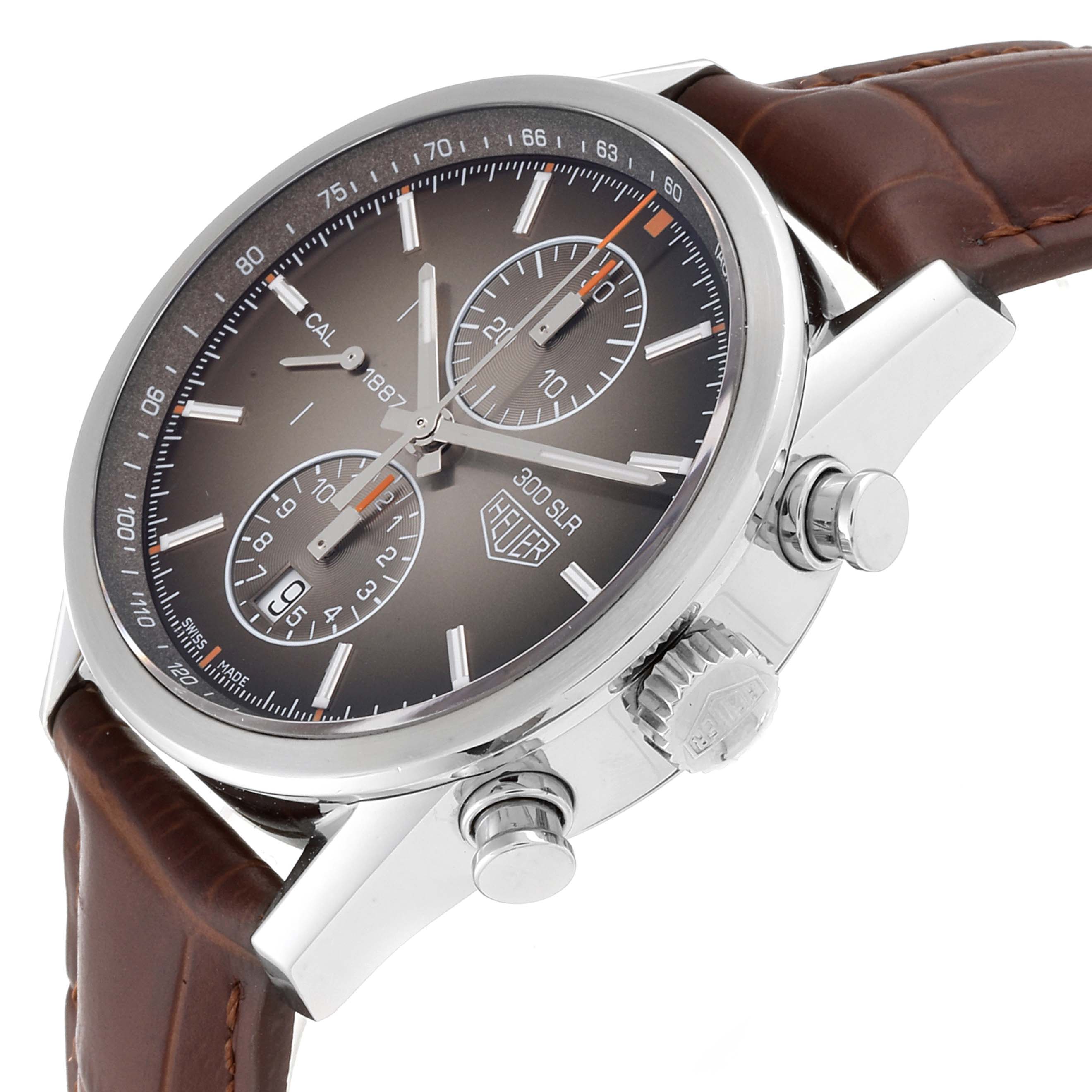 The Tag Heuer Carrera CAR2112.FC6267 Men
s Stainless Steel Brown Dial CAR2112.FC6267 Men
s Stainless Steel Brown Dial watch is shown at an angled side view, displaying its dial, crown, pushers, and leather strap.
