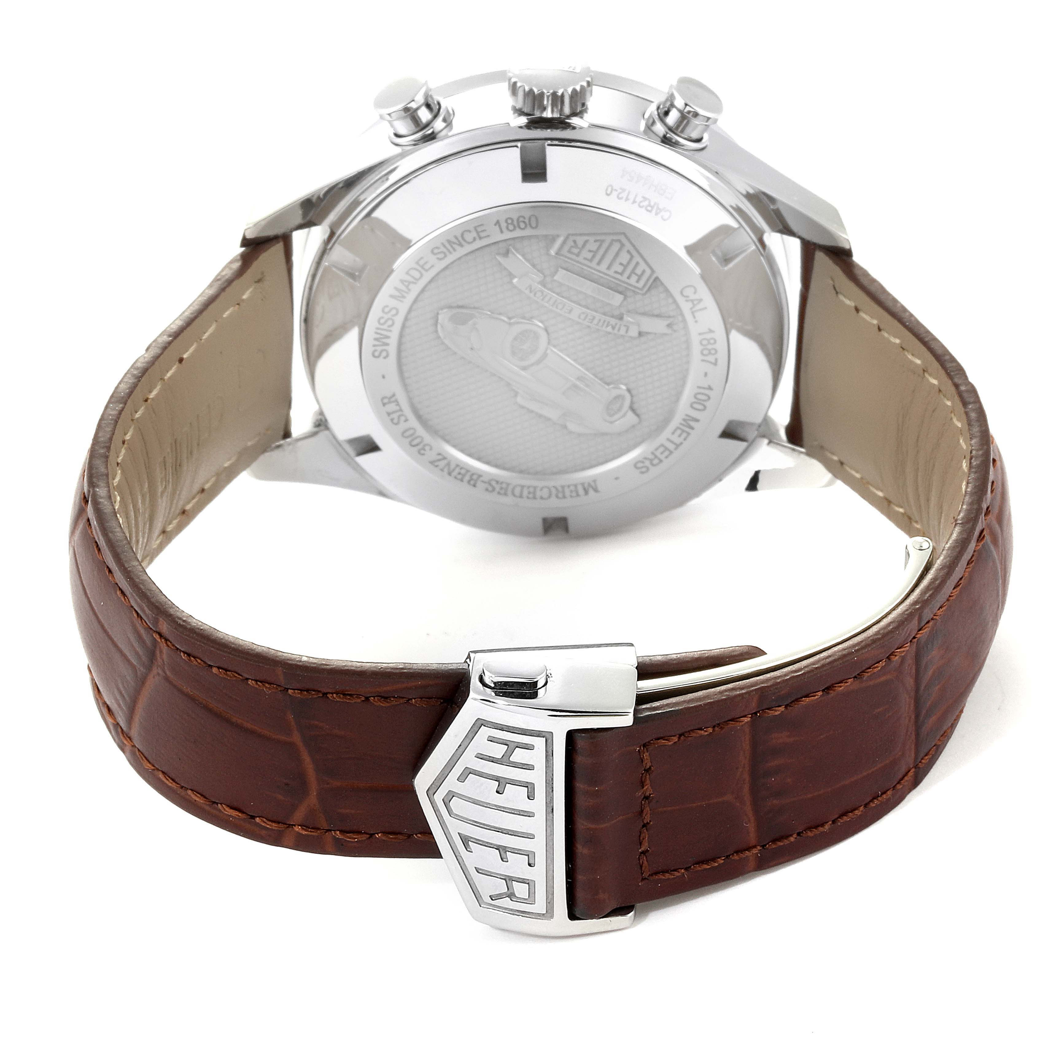This image shows the back view of a Tag Heuer Carrera CAR2112.FC6267 Men
s Stainless Steel Brown Dial CAR2112.FC6267 Men
s Stainless Steel Brown Dial watch with its case back and brown leather strap.