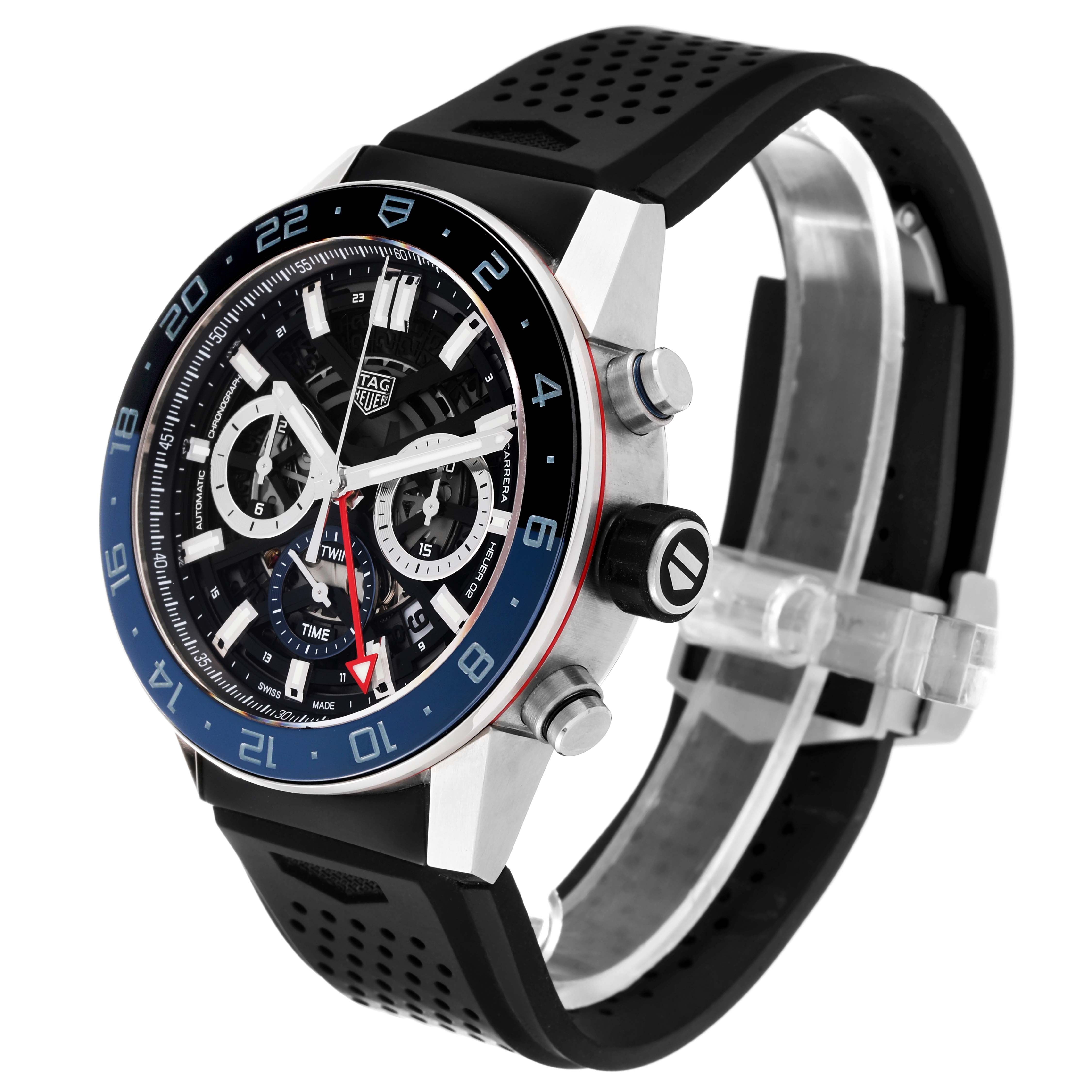 The Carrera model by Tag Heuer is shown at a three-quarter angle, highlighting the dial, bezel, and strap.