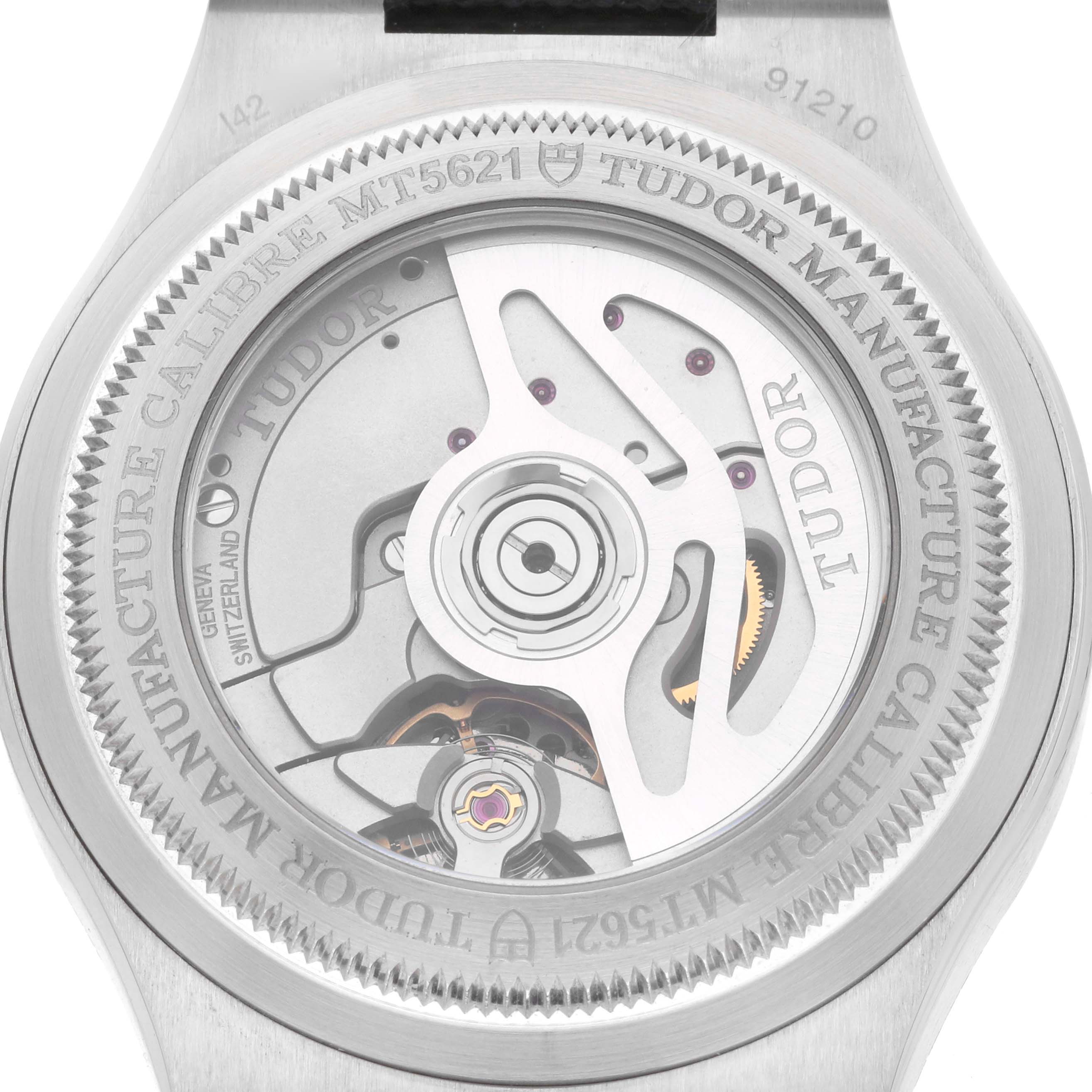 The image shows the back of the Tudor Pelagos 91210N Men
s Stainless Steel Black Dial watch, revealing the movement and engraving details.