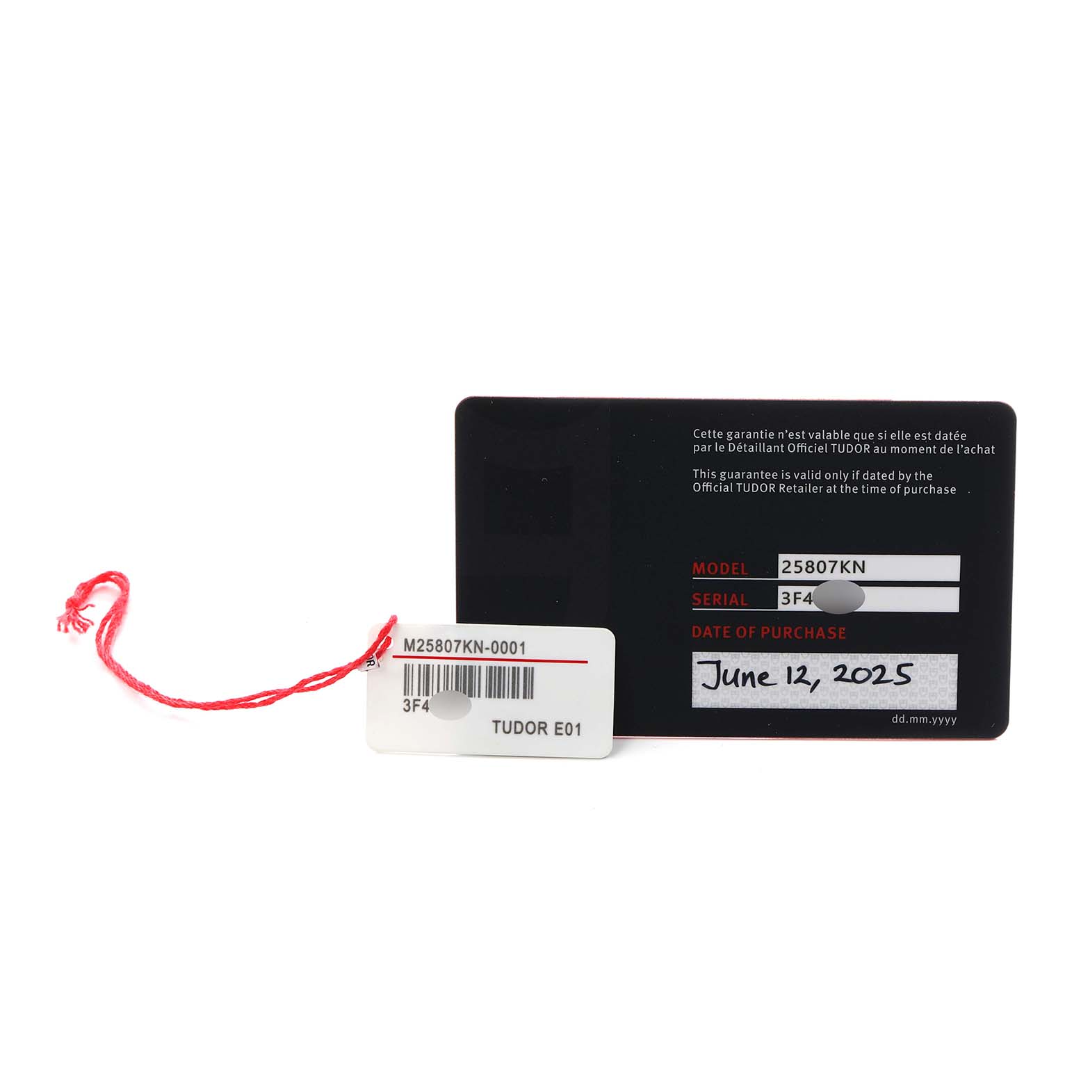 The image shows the warranty card and tag for a Tudor Pelagos 25827KN Men
s Stainless Steel Blue Dial model, highlighting the model and serial number.