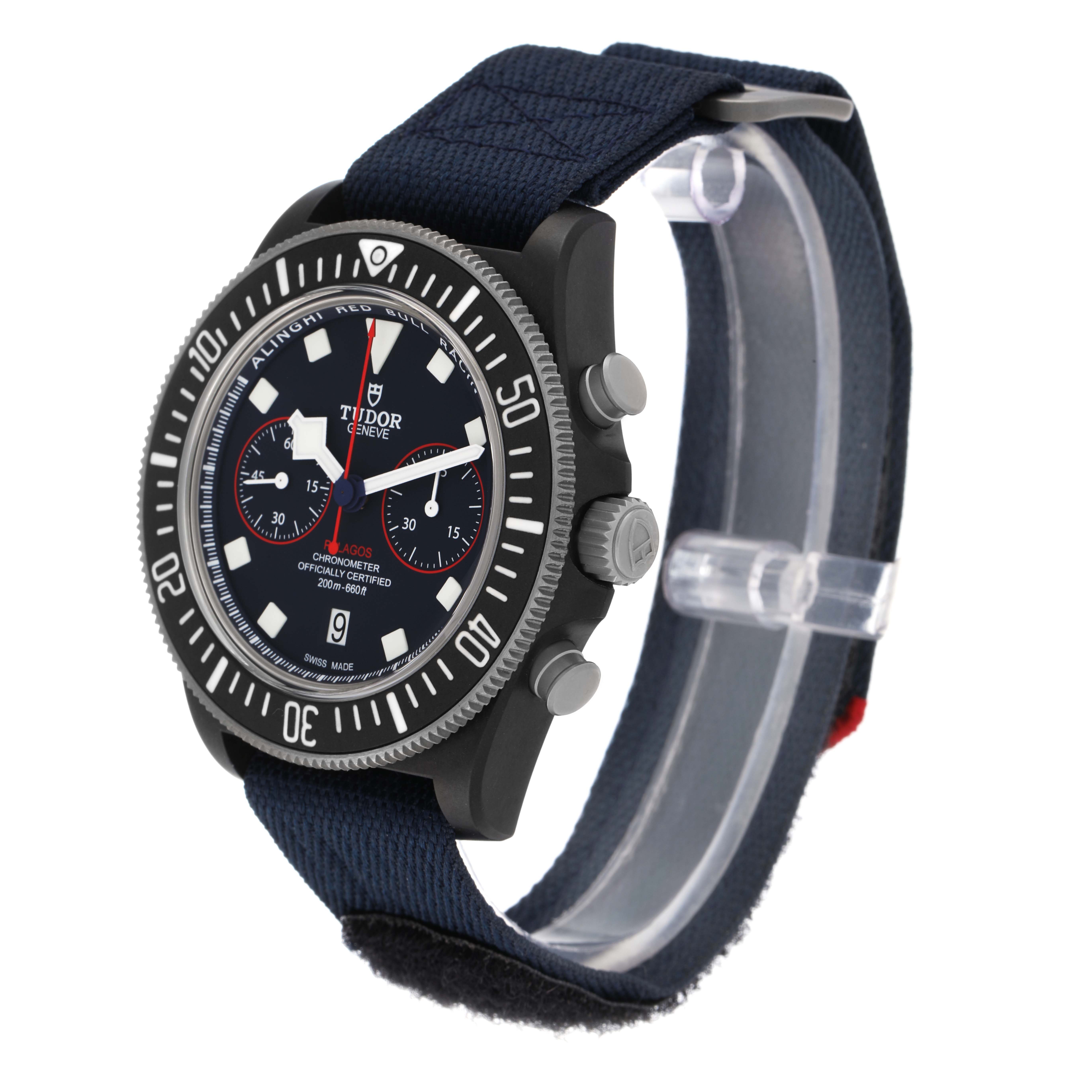 The Tudor Pelagos 25827KN Men
s Stainless Steel Blue Dial watch is shown at a three-quarter angle displaying the face, bezel, and side buttons with a textile strap.