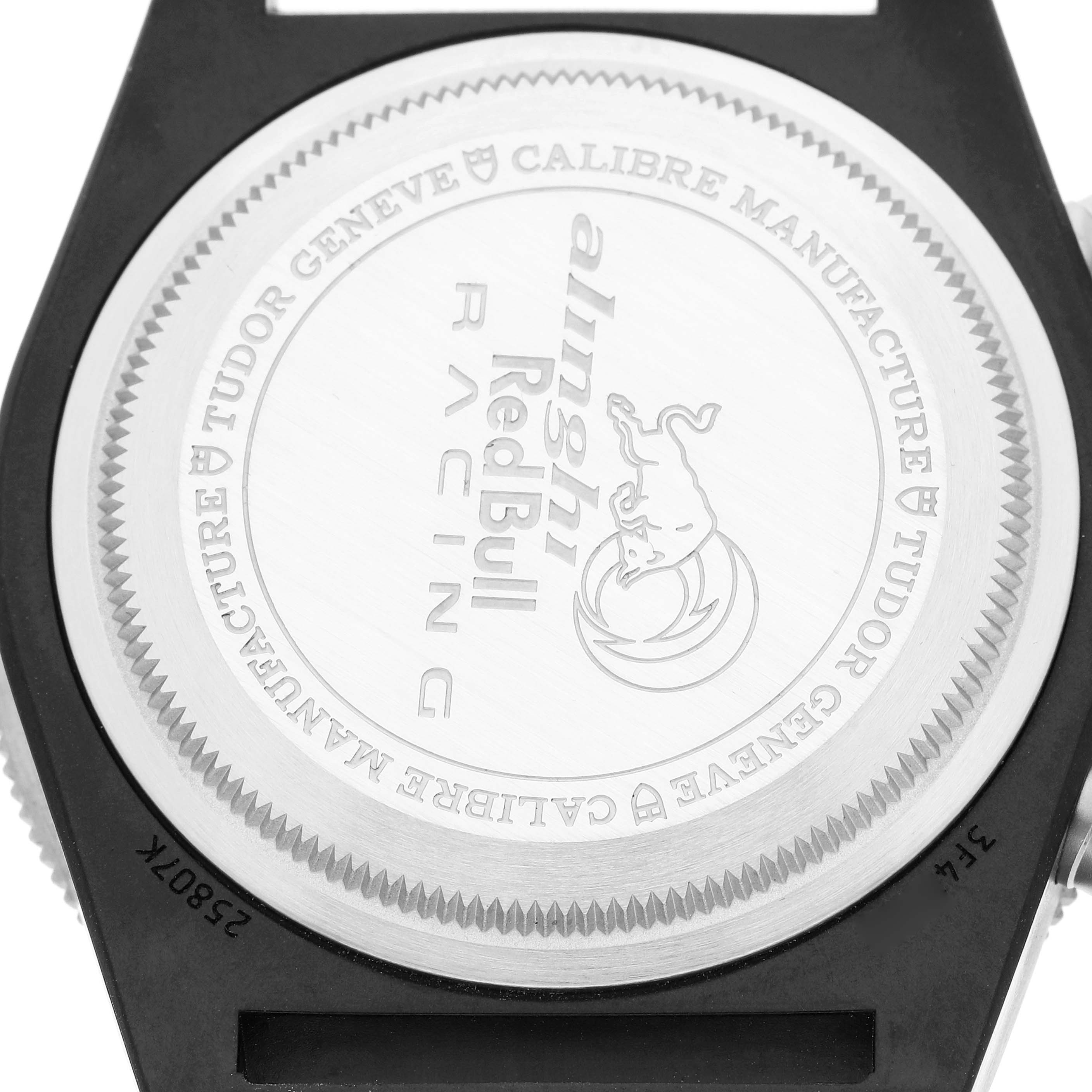 The image shows the back of a Tudor Pelagos 25827KN Men
s Stainless Steel Blue Dial watch featuring its engraved case back design.