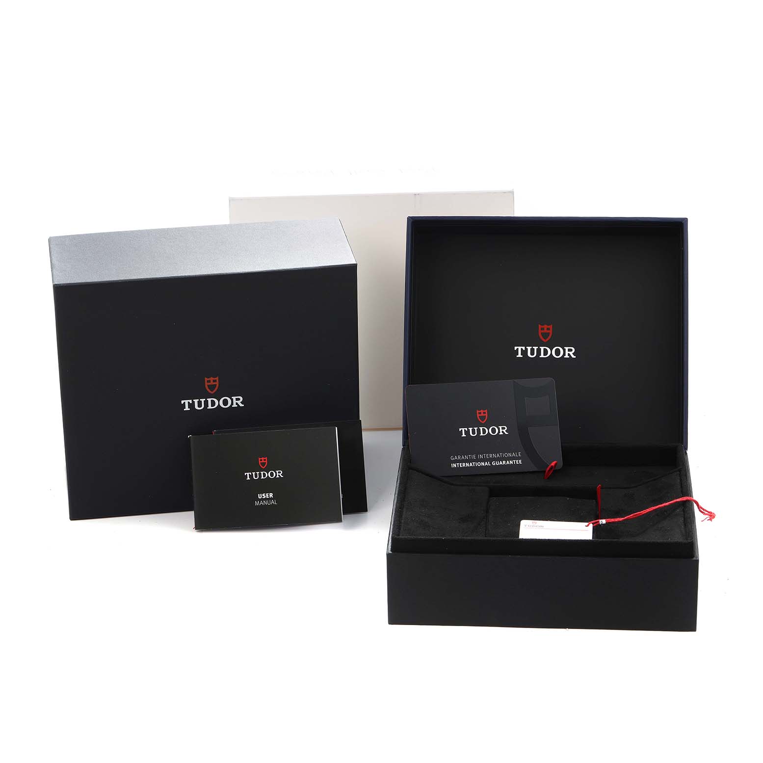 The image shows the open packaging for the Tudor Pelagos 25827KN Men
s Stainless Steel Blue Dial watch, including the box, user manual, and guarantee card.