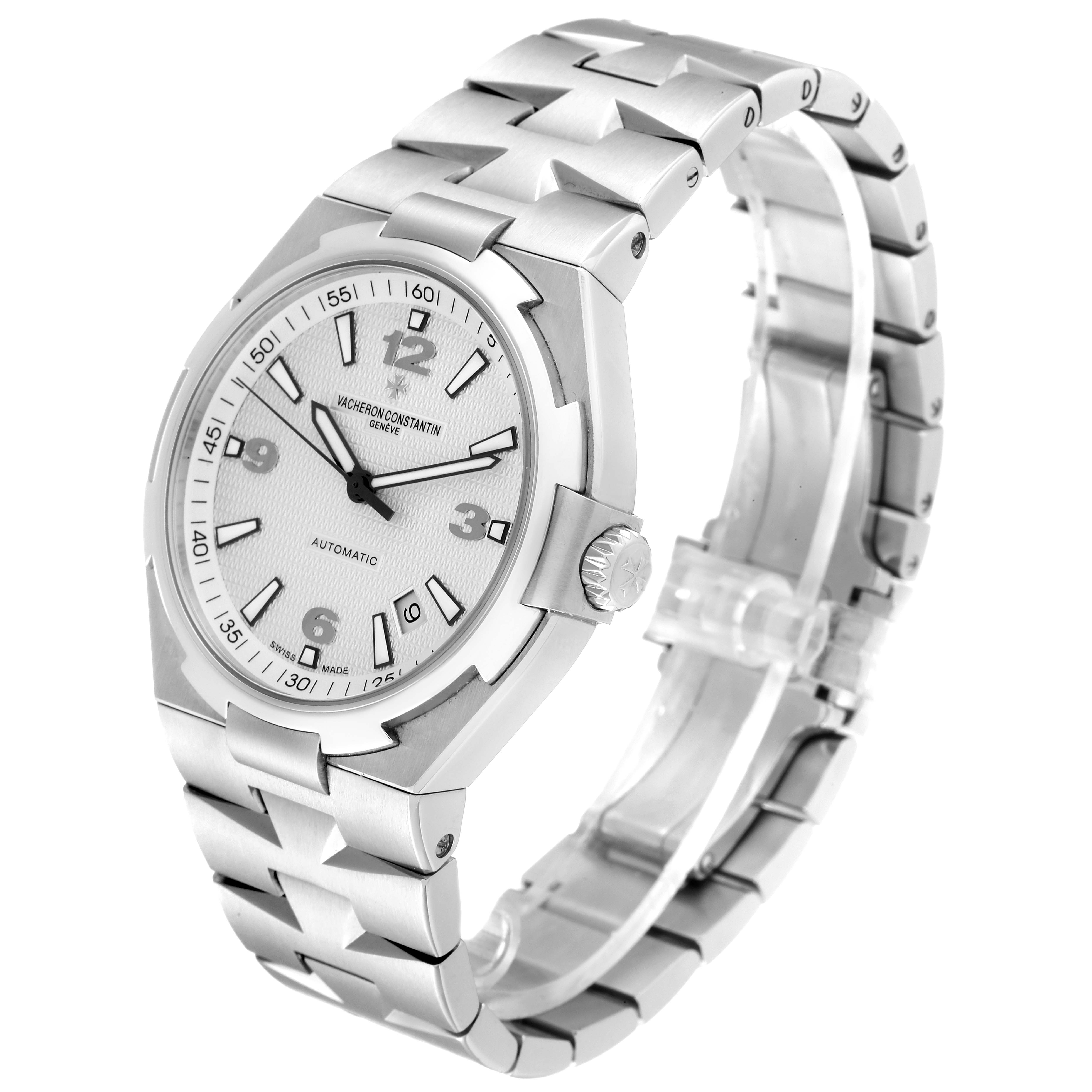 The image shows a Vacheron Constantin Overseas 47040B01A-9093 Men's Stainless Steel Silver Dial 47040B01A-9093 Men's Stainless Steel Silver Dial watch at a three-quarter angle highlighting the face, bezel, and stainless steel bracelet.